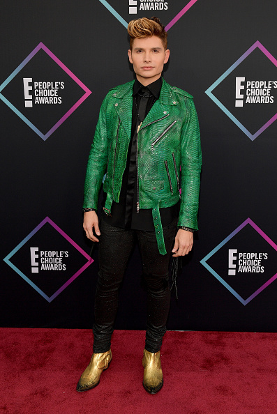Unconventional? Sure. Christian Acosta put his best fashion foot forward in a black ensemble and gold shoes. Adding a pop of color with this green leather piece was definitely a great idea! (Photo by Matt Winkelmeyer/Getty Images)