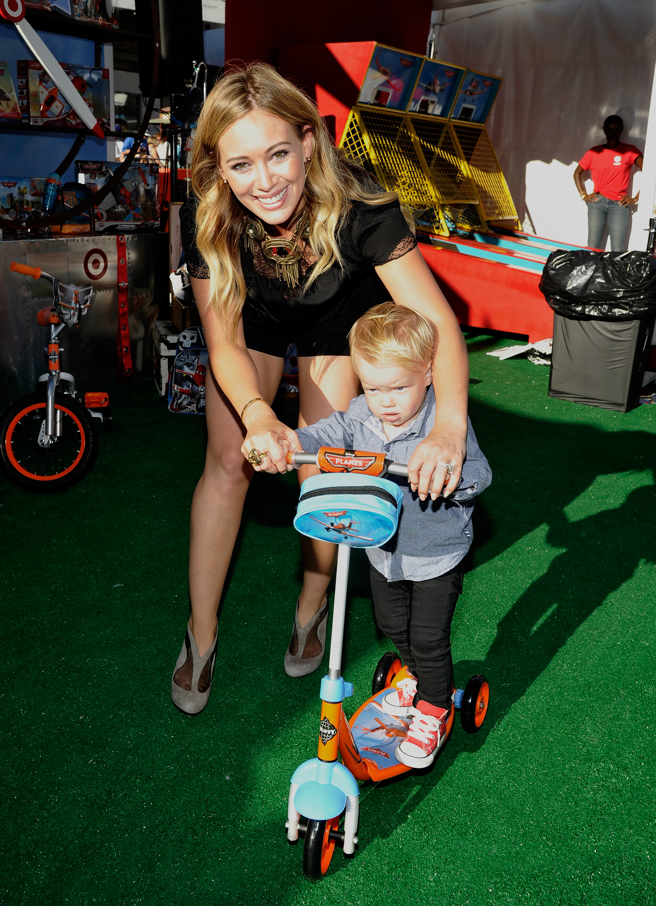 Actress Hilary Duff and son Luca Cruz Comrie at the world-premiere of 'Disney's Planes' presented by Target at the El Capitan Theatre on August 5, 2013 in Hollywood, California. (Photo by John Sciulli/Getty Images for Target)