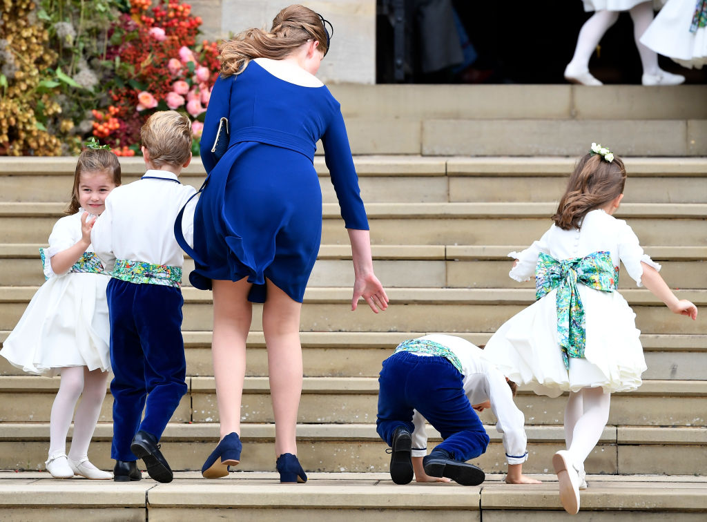 Bridesmaid Princess Charlotte of Cambridge (L) arrives with bridesmaids and pageboys for the royal wedding of Princess Eugenie of York and Jack Brooksbank at St. George's Chapel on October 12, 2018, in Windsor, England. (Getty Images)