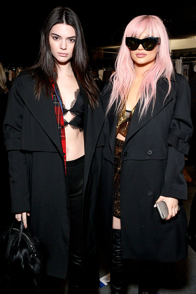 Kendall Jenner (L) and Kylie Jenner pose backstage at the Vera Wang Collection Fall 2016 fashion show during New York Fashion Week: The Shows at The Arc, Skylight at Moynihan Station on February 16, 2016 in New York City. (Photo by Astrid Stawiarz/Getty Images for NYFW: The Shows)