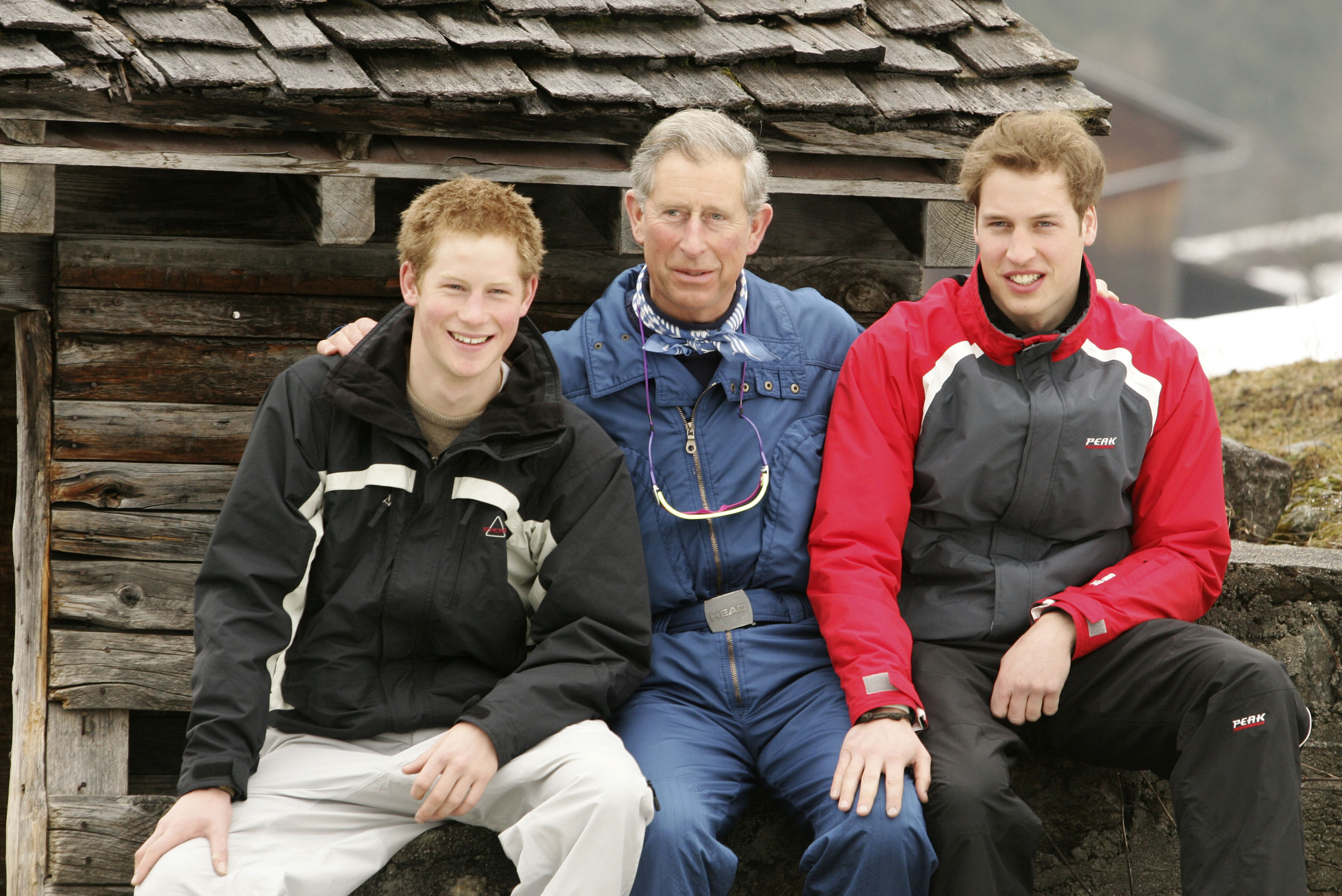 HRH Prince Charles poses with his sons Prince William (R) and Prince Harry (L) during the Royal Family's ski break at Klosters on March 31, 2005, in Switzerland.