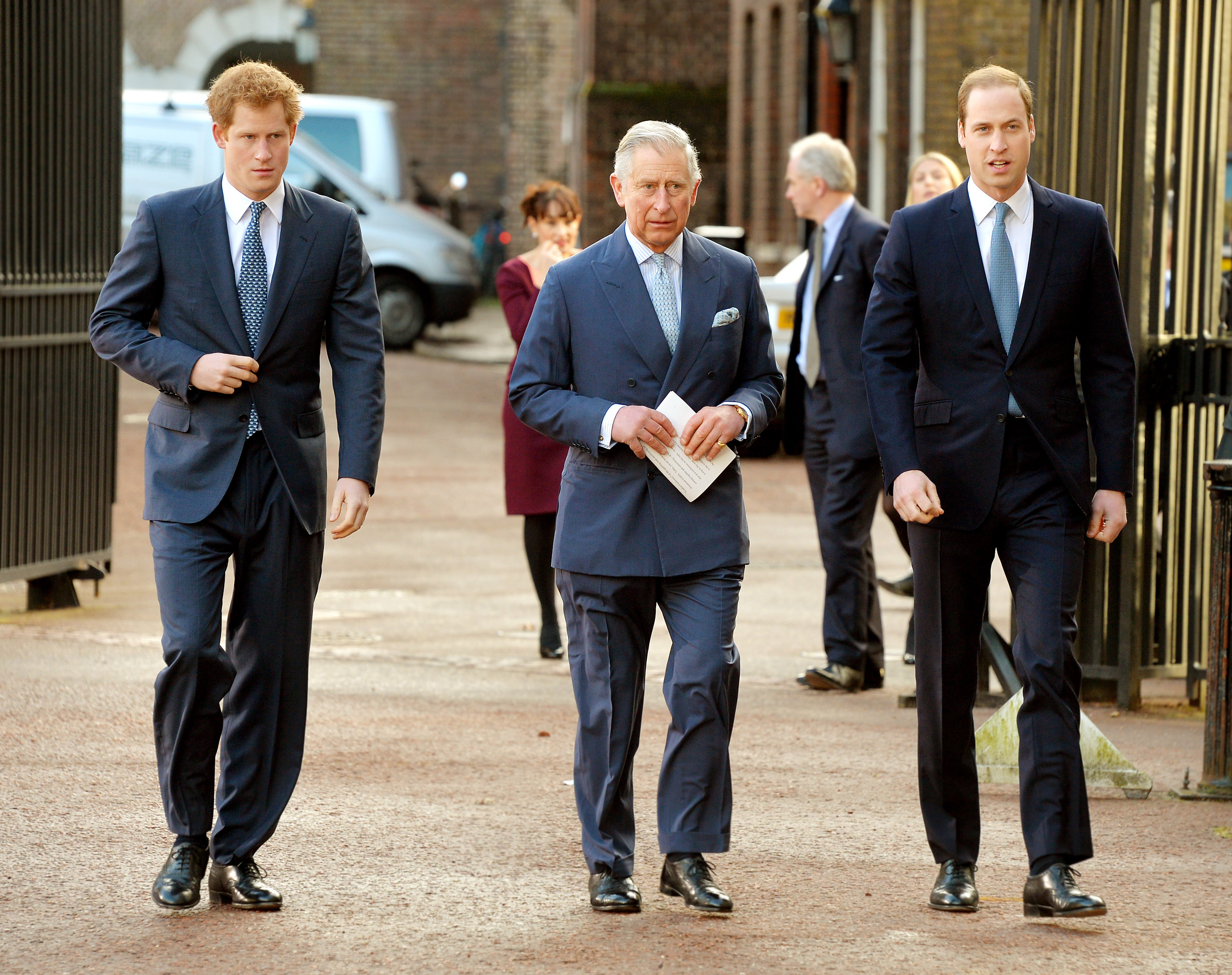 LONDON, ENGLAND - FEBRUARY 13: (L-R) Prince Harry, Prince Charles, Prince of Wales and Prince William, Duke of Cambridge arrive at the Illegal Wildlife Trade Conference at Lancaster House on February 13, 2014 in London, England. It is hoped that following discussions at the conference, nations will sign a declaration that will commit them to a range of goals to combat the poaching that is threatening animals such as tigers, elephants and rhinos. (Photo by John Stillwell - WPA Pool/Getty images)