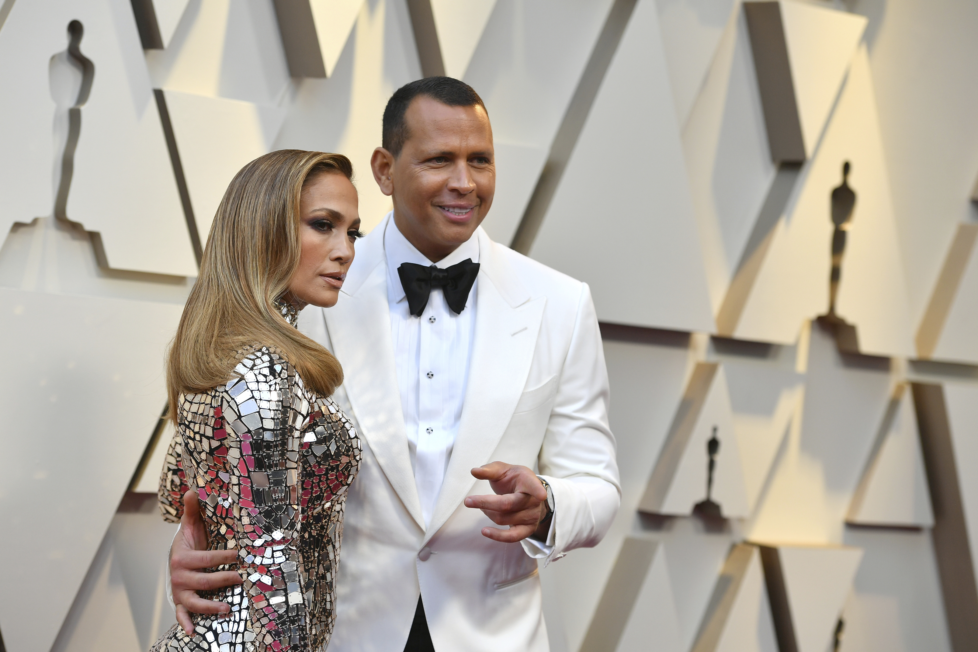 In this Feb. 24, 2019 file photo, Jennifer Lopez, left, and Alex Rodriguez arrive at the Oscars at the Dolby Theatre in Los Angeles. (Photo by Jordan Strauss/Invision/AP, File)