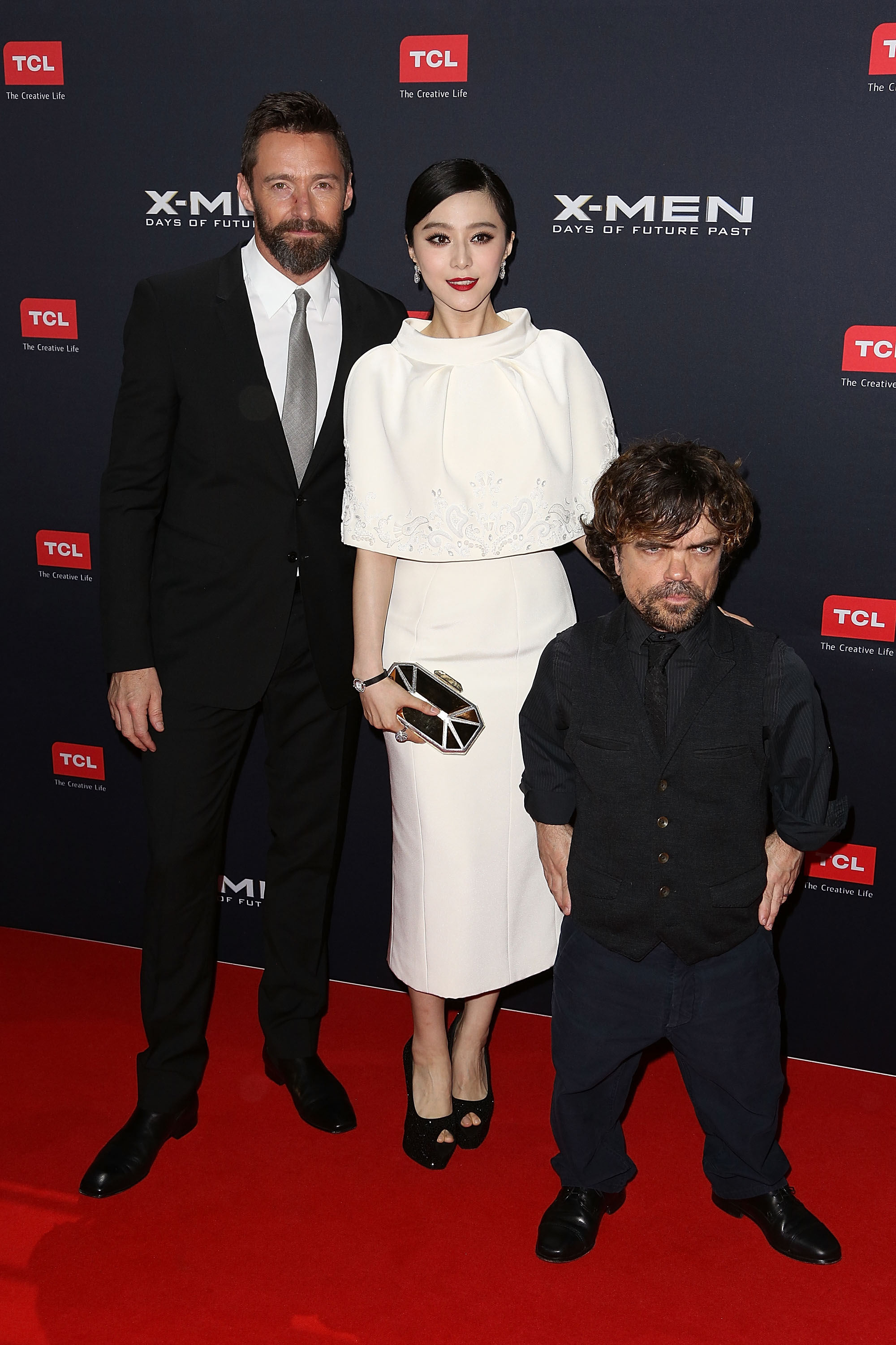 (L-R) Hugh Jackman, Fan Bingbing, and Peter Dinklage pose as they arrive at the Australian premiere of 'X-Men: Days of Future Past' (Source: Graham Denholm/Getty Images)