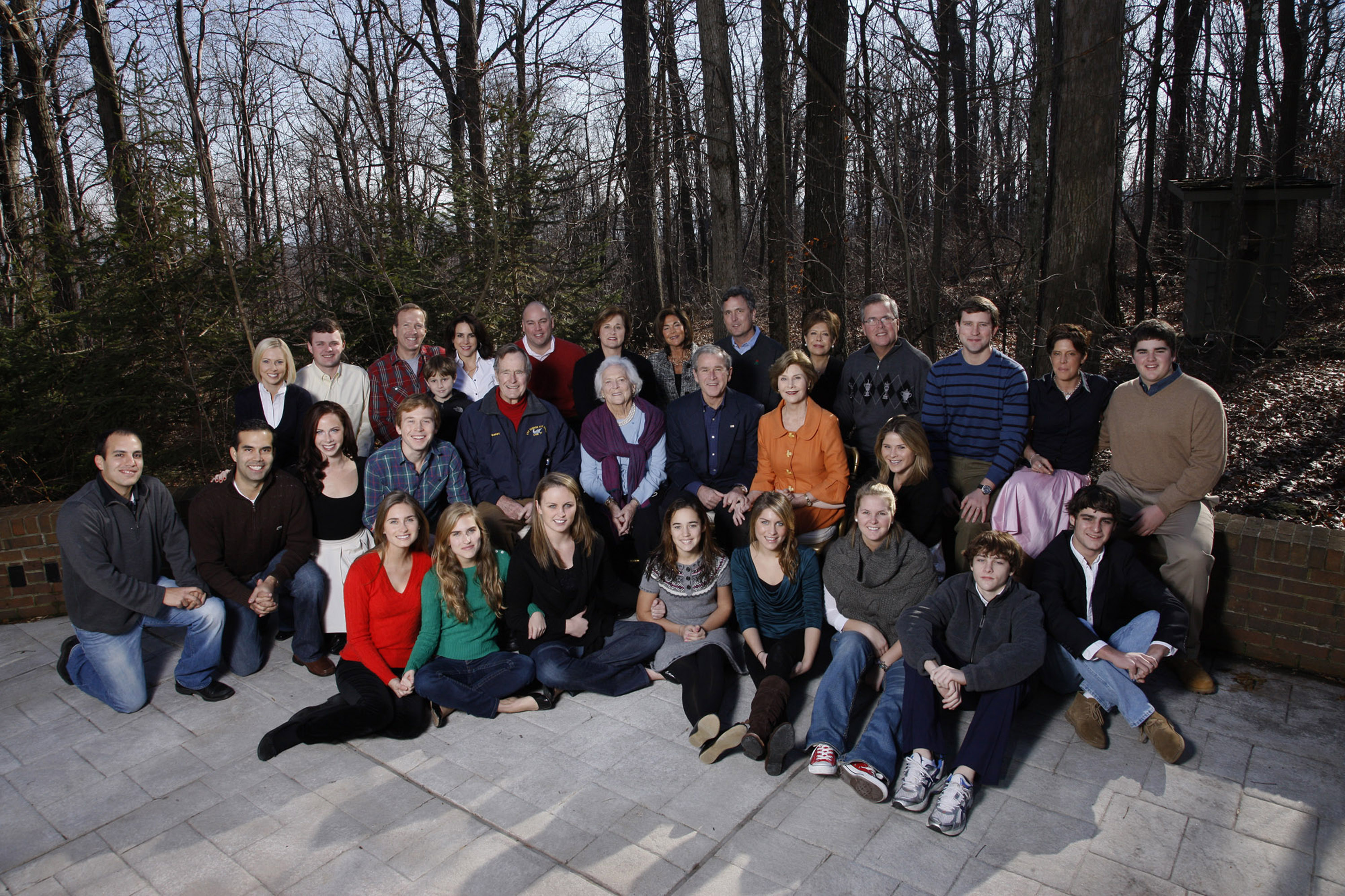 In this handout image provided by the White House, US President George W. Bush and family gather on Christmas December 25, 2008 at Camp David, Maryland. Seated front row, Lauren Bush, Ashley Bush, Ellie LeBlond, Gigi Koch, Elizabeth Andrews, Marshall Bush, Pace Andrews, Walker Bush. Second row, John E. Bush, George P. Bush, Barbara Bush, Pierce Bush, former US President George H.W. Bush, former First Lady Barbara Bush, President George W. Bush, First Lady Laura Bush, Jenna Hager.