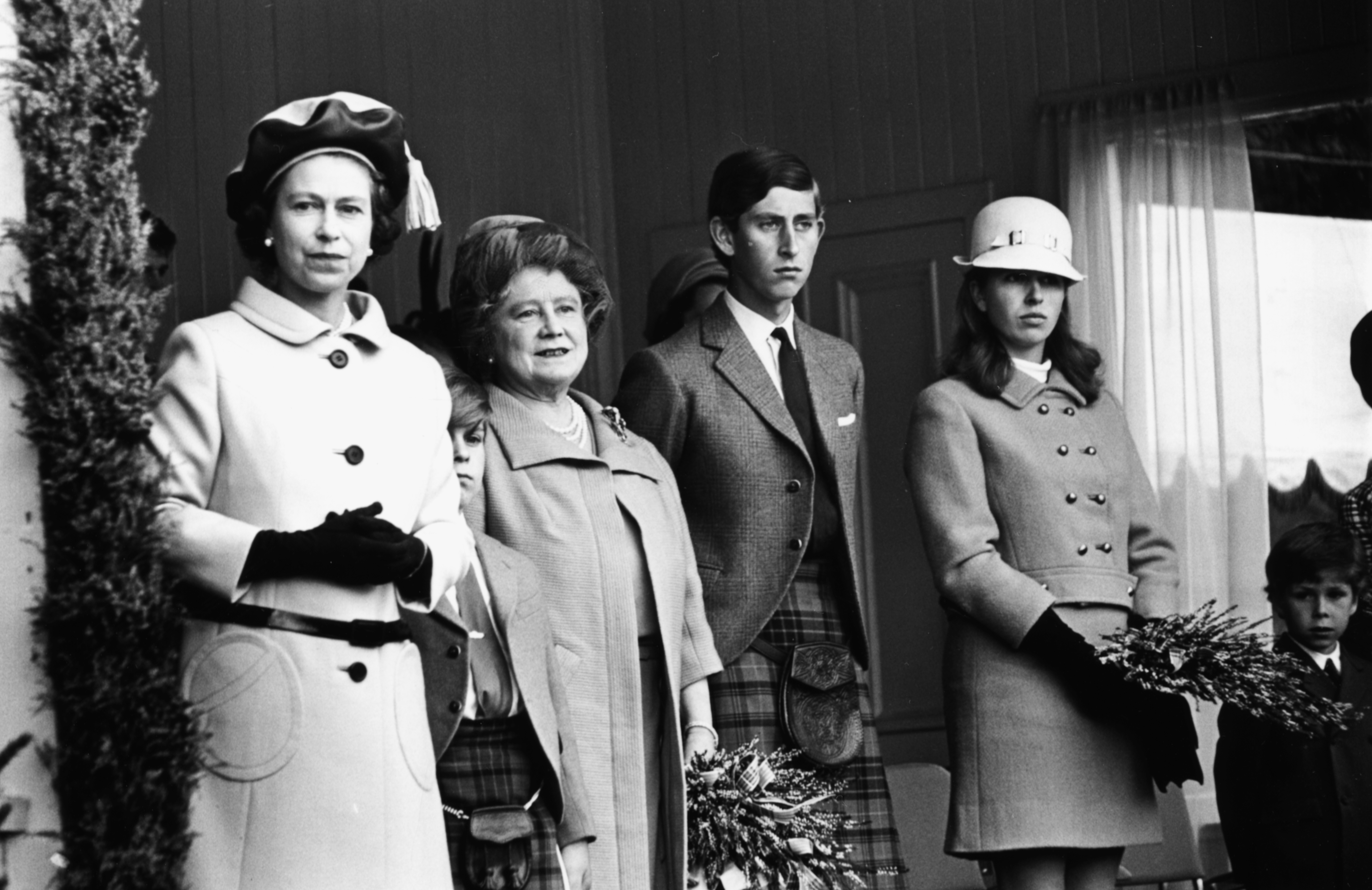 Queen Elizabeth II (left) with her family (L-R) Prince Andrew, the Queen Mother, Prince Charles and Princess Anne, watching the annual games at the Braemar Royal Highland gathering, Scotland, September 8th 1968. (Photo by Mike McLaren/Central Press/Getty Images)