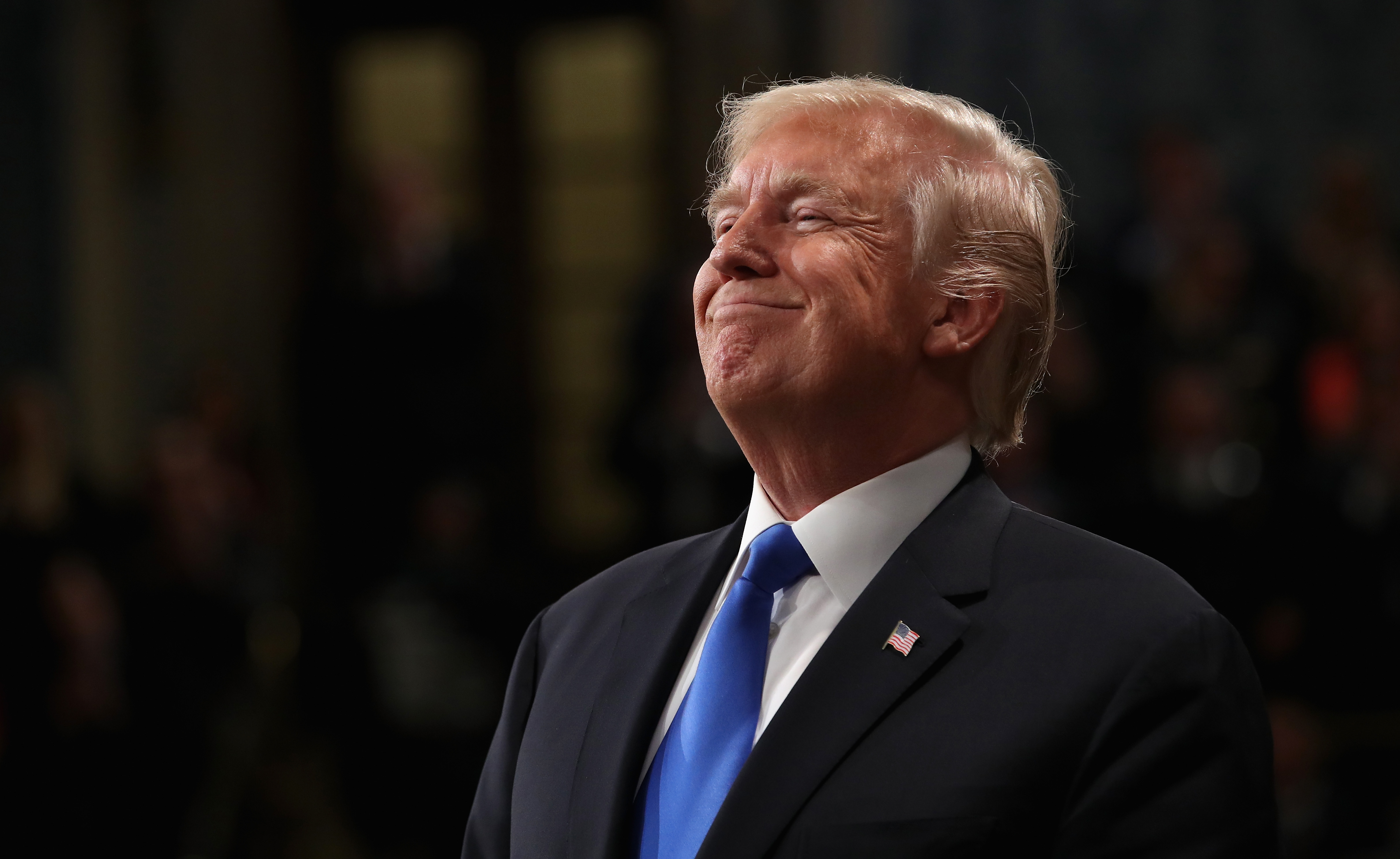 U.S. President Donald J. Trump smiles during the State of the Union address in the chamber of the U.S. House of Representatives January 30, 2018 in Washington, DC.