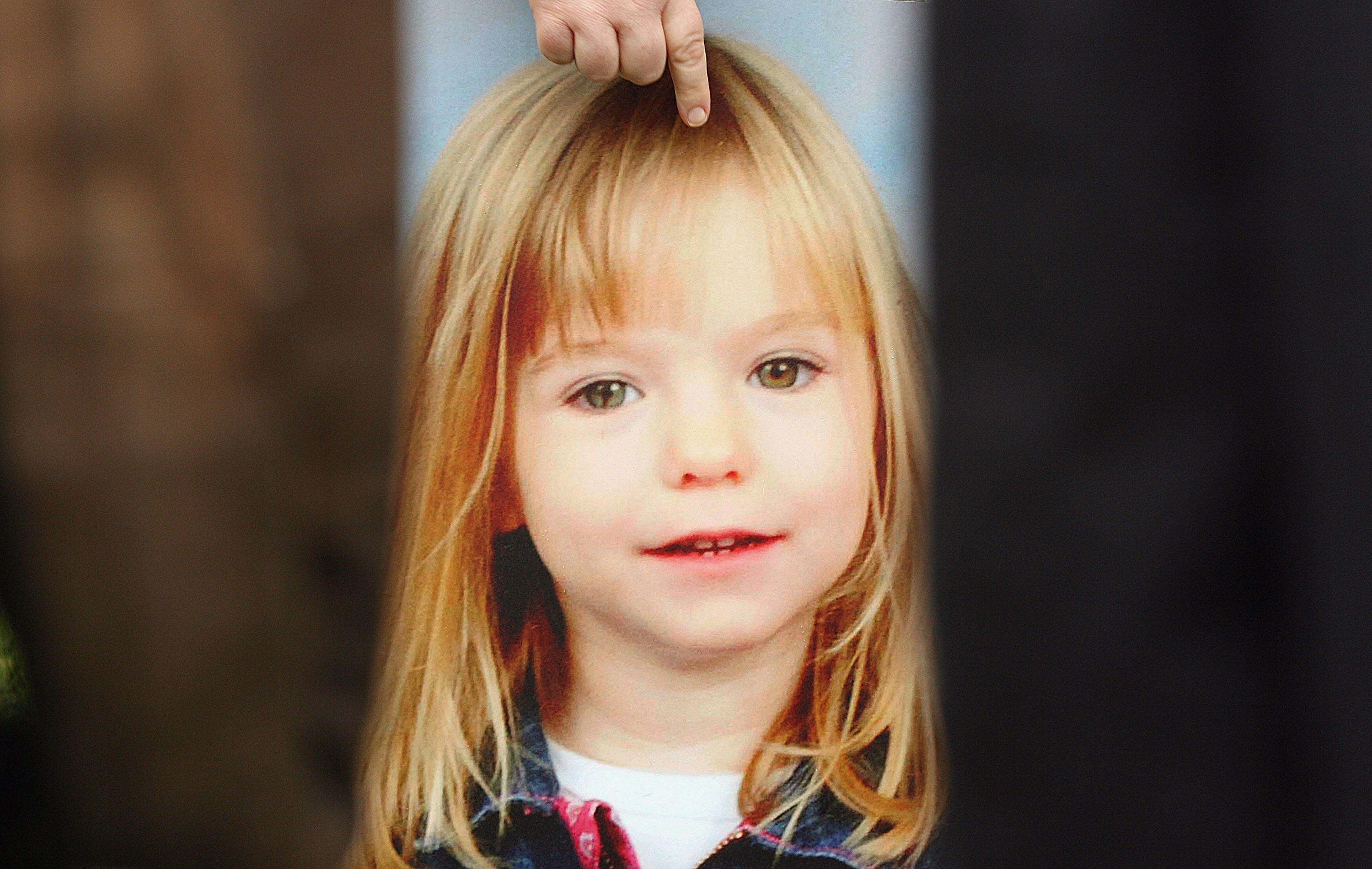 A picture of missing toddler Madeleine McCann is held by her aunt Philomena McCann as she gives television interviews after visiting Parliament on May 16, 2007, in London. Madeleine McCann disappeared from a holiday complex in Praia da Luz, Portugal 13 days ago. (Getty Images)