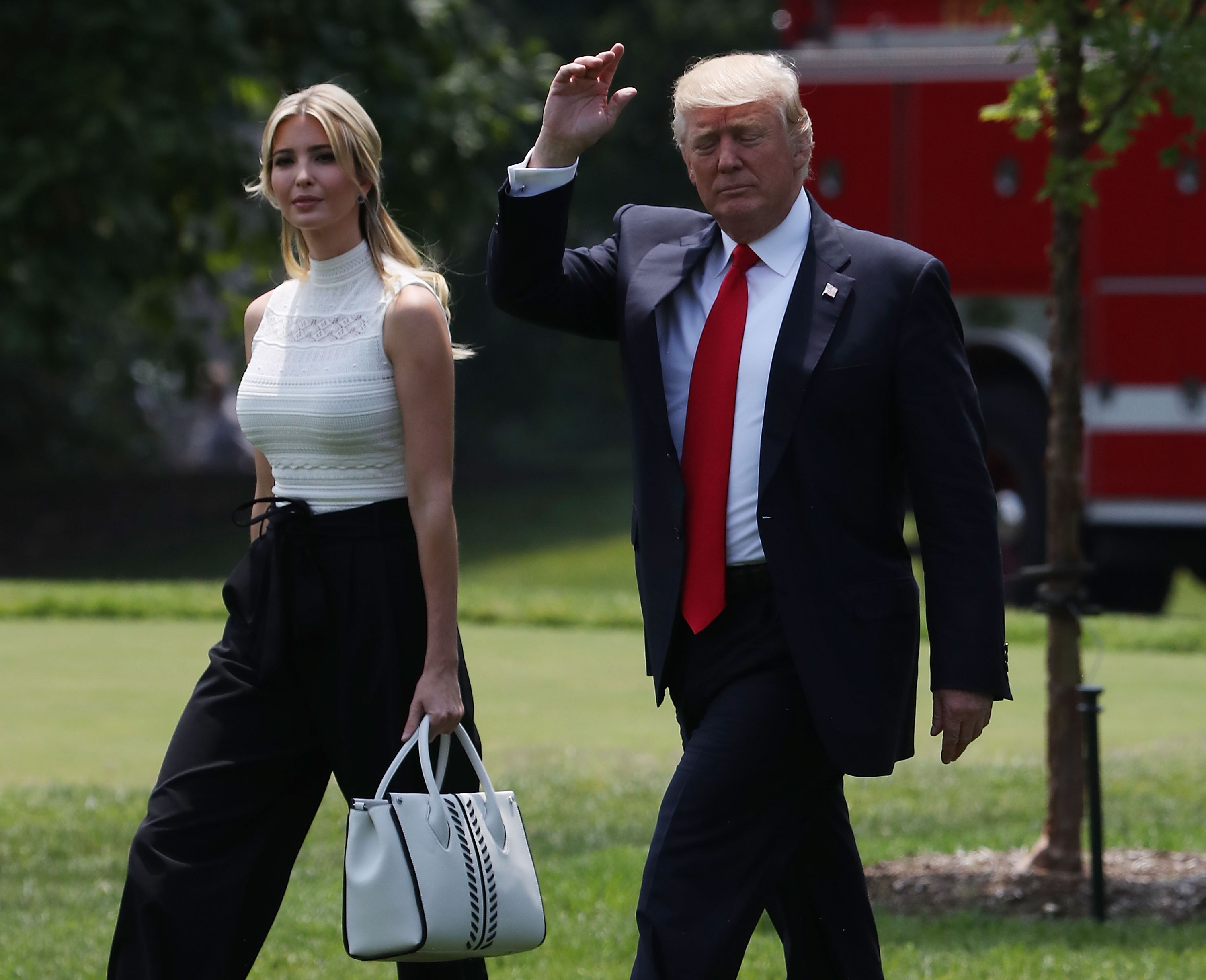 WASHINGTON, DC - JUNE 13: U.S. President Donald Trump and daughter Ivanka Trump walk toward Marine One before departing from the White House on June 13, 2017 in Washington, DC. President Trump is traveling to Milwaukee, Wisconsin. Trump will visit Waukesha County Technical College and also appear at a political fundraiser. (Photo by Mark Wilson/Getty Images)
