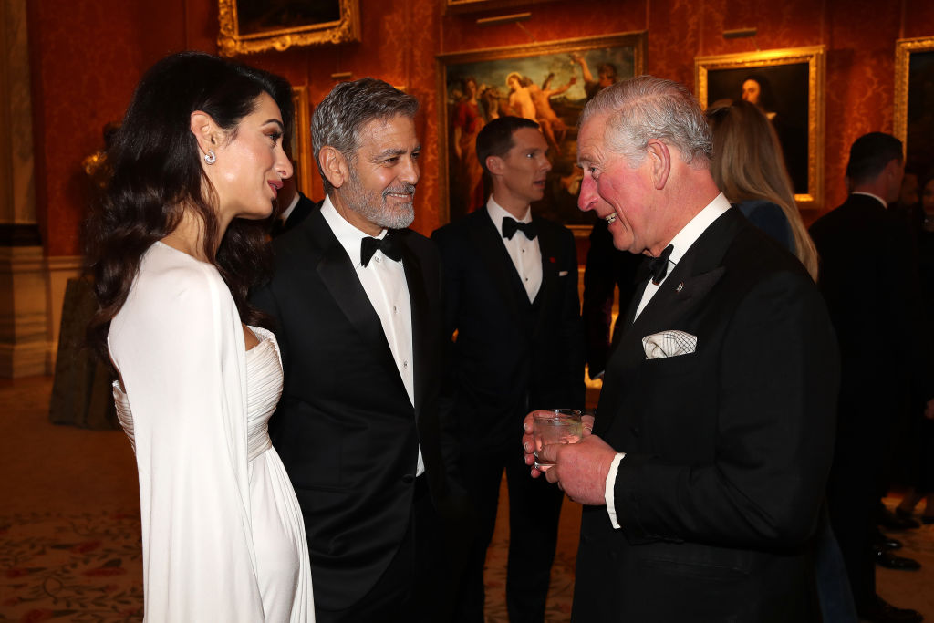 The A-list couple, who have had a close relationship with the British royals, were spotted having an intensely animated conversation with the Prince of Wales. (Photo by Chris Jackson - WPA Pool/Getty Images)