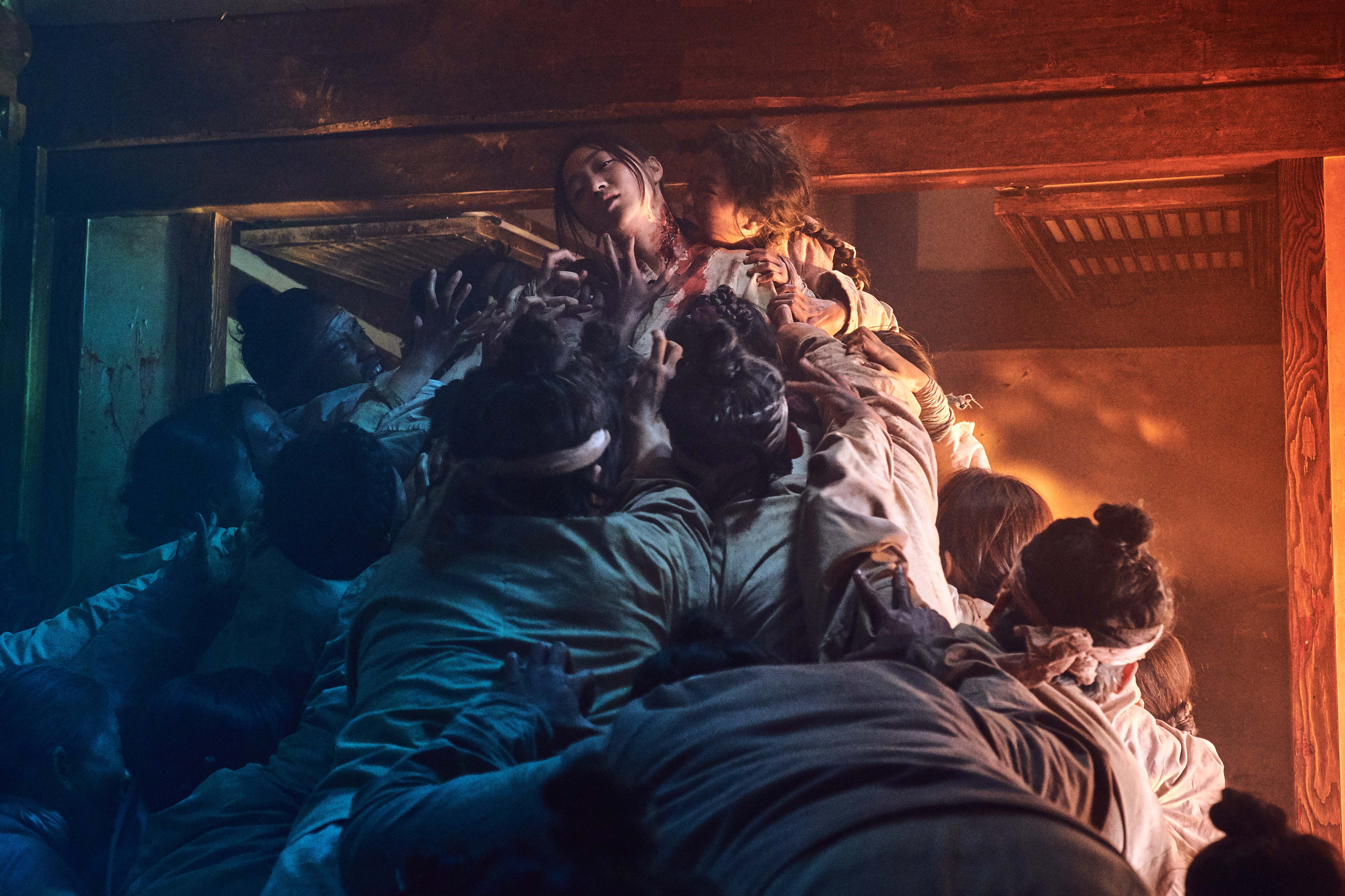 The zombie plague poses a direct threat to the kingdom - both in terms of striking the civilians with panic, and also acting as an atrocious epidemic. Source: Netflix
