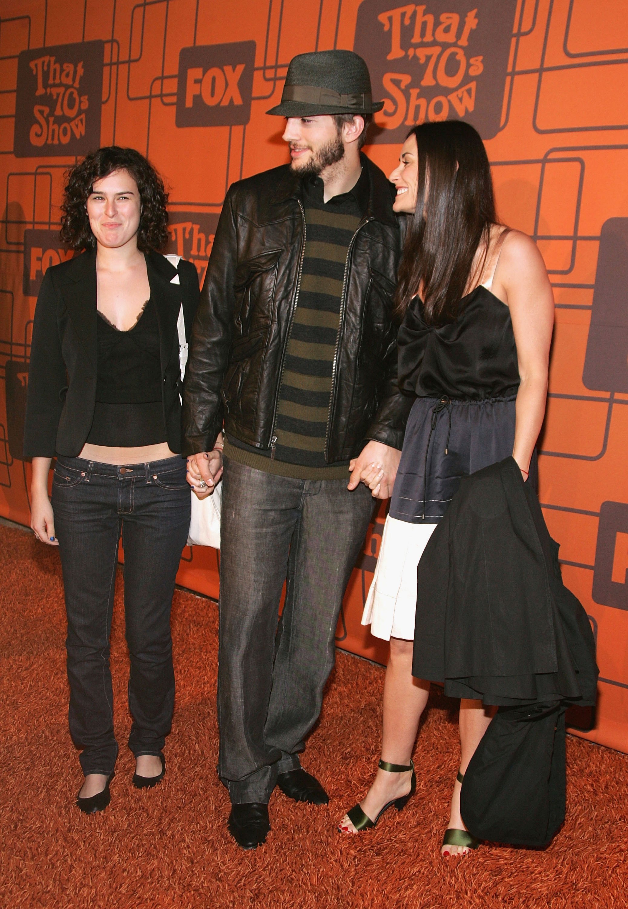 Ashton Kutcher, Demi Moore and her daughter Rumer Willis (L) arrive at the Fox Television 'That 70s Show' wrap party held at Tropicana at The Roosevelt Hotel on may 6, 2006 in Hollywood, California.