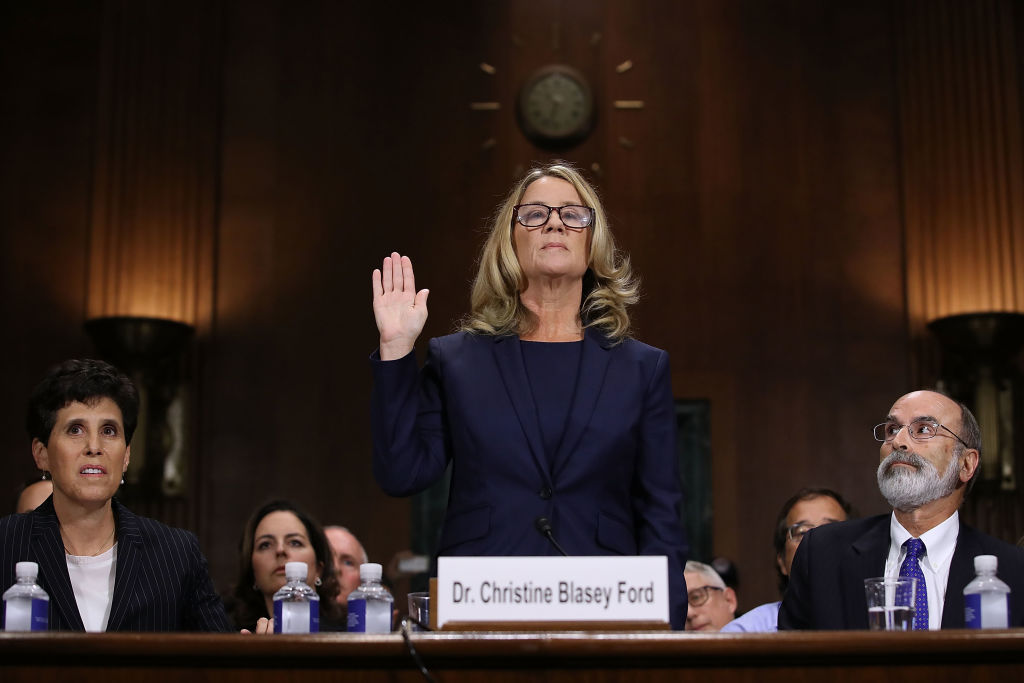 Christine Blasey Ford is sworn in before testifying the Senate Judiciary Committee in the Dirksen Senate Office Building on Capitol Hill September 27, 2018, in Washington, DC (Source: Win McNamee/Getty Images)