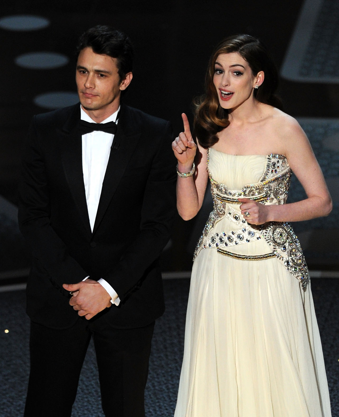 Hosts James Franco and Anne Hathaway speak onstage during the 83rd Annual Academy Awards held at the Kodak Theatre on February 27, 2011 in Hollywood, California.