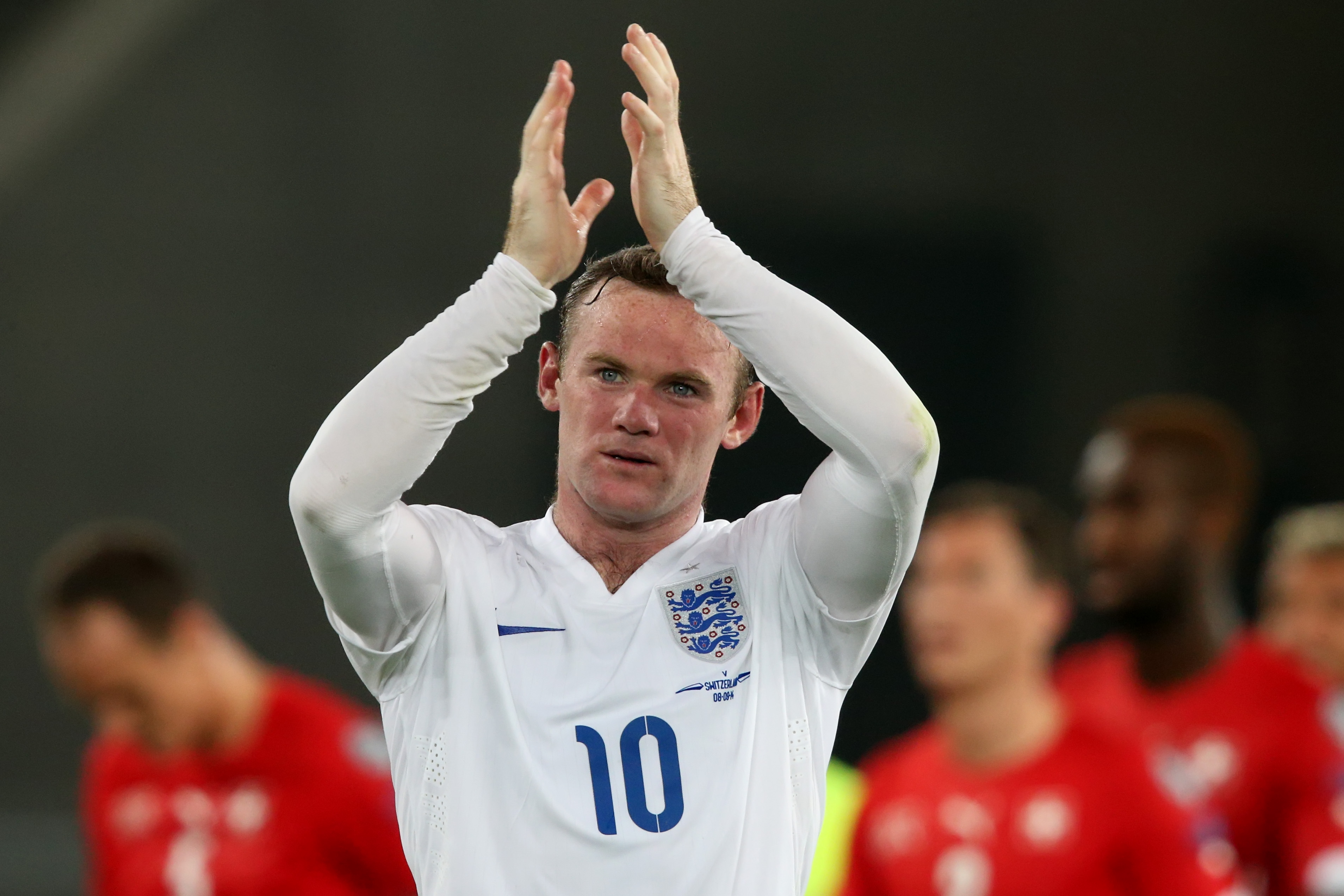 Wayne Rooney of England applauds the fans after the EURO 2016 Qualifier match between Switzerland and England on September 8, 2014 in Basel, Switzerland.