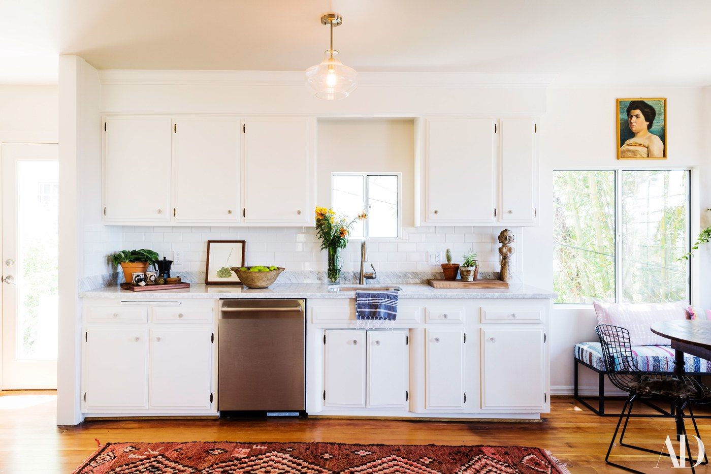 Blazek kept the 90-year-old home light and airy to complement the incredible view, but added pops of color and vintage pieces to embrace List's bohemian style.