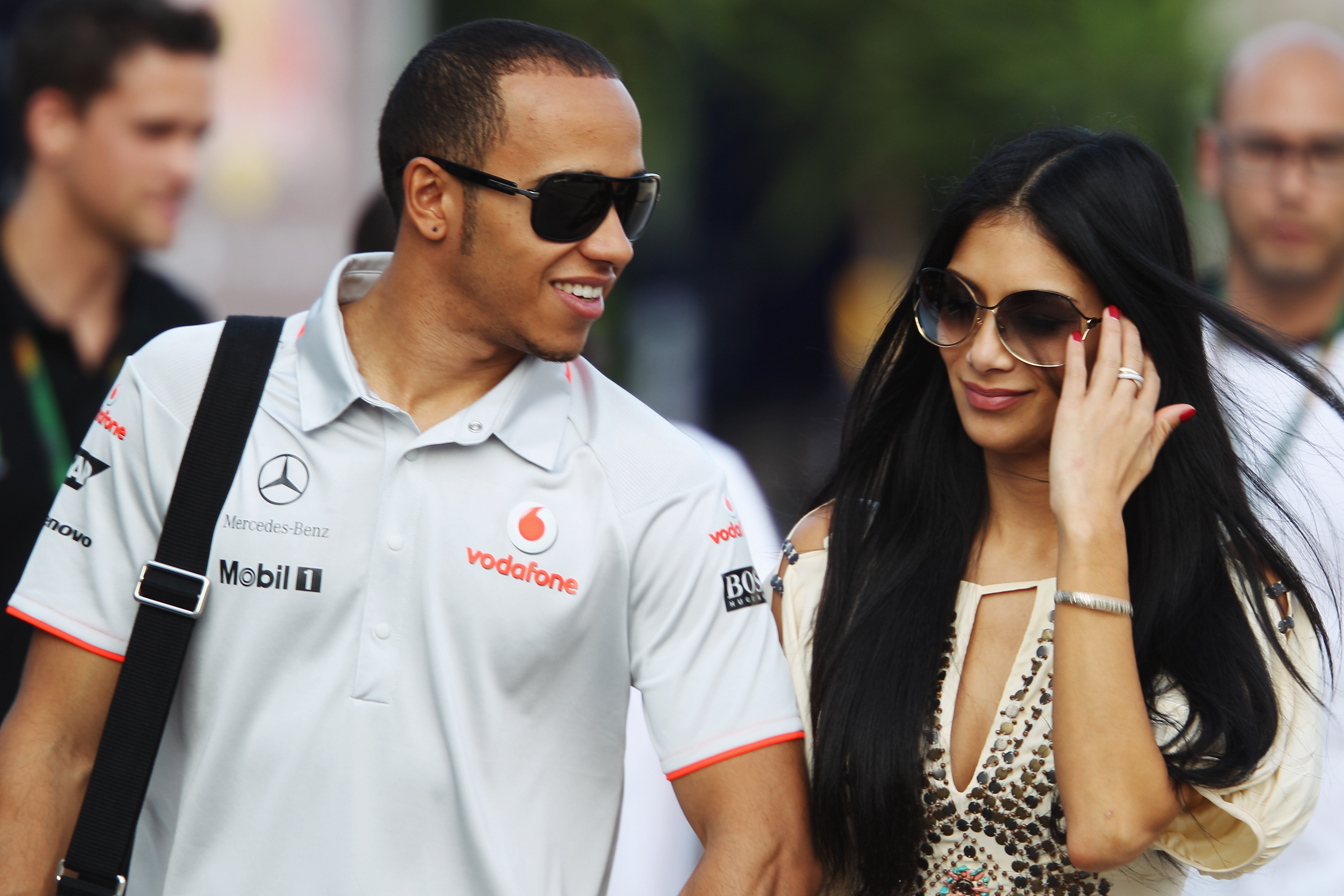 Lewis Hamilton of Great Britain and McLaren Mercedes and his girlfriend Nicole Scherzinger of the Pussycat Dolls walk in the paddock following qualifying for the Turkish Formula One Grand Prix at Istanbul Park on May 29, 2010, in Istanbul, Turkey.