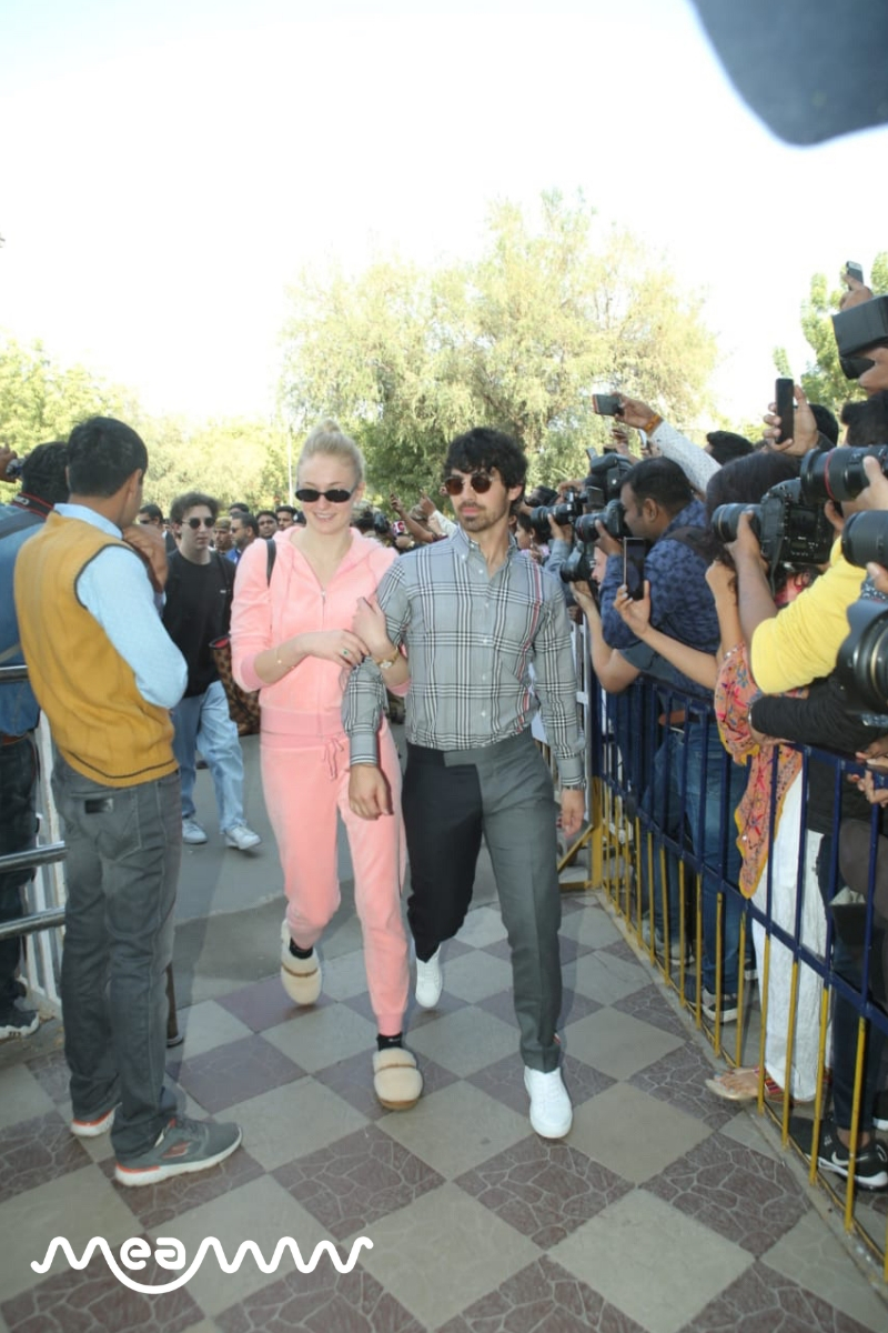 Nick's brother Joe Jonas along with his fiance Sophie Turner as they made their way towards the Jodhpur airport terminal for their travel to Delhi. (Meaww Photos)