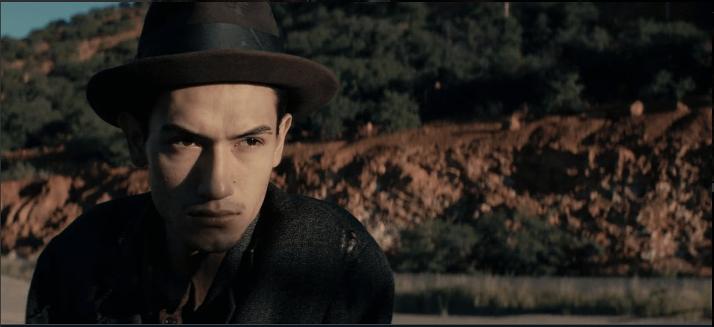 Fernando Serrano looks on in a still from Bisbee'17.