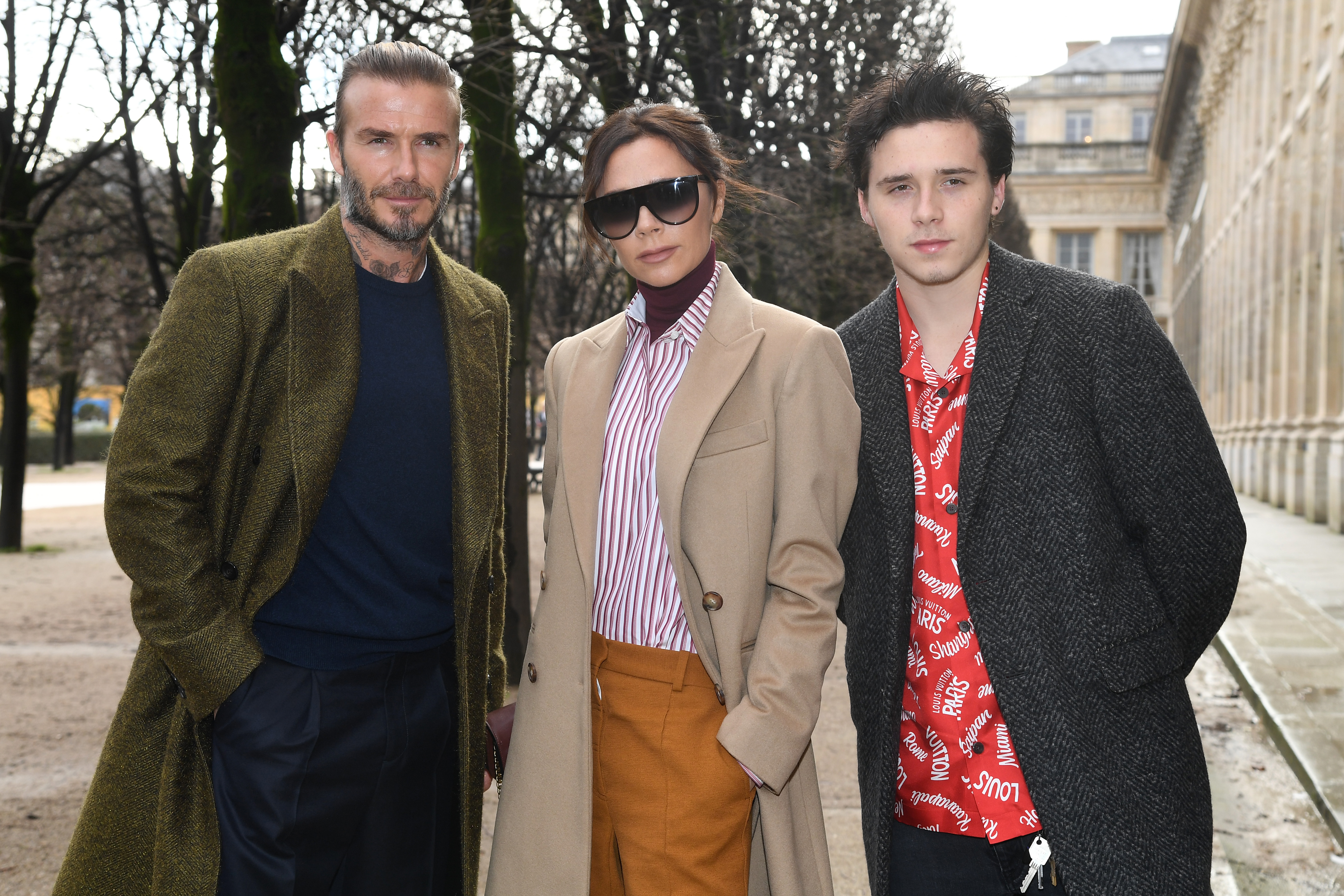 David Beckham, Victoria Beckham and Brooklyn Beckham attend the Louis Vuitton Menswear Fall/Winter 2018-2019 show as part of Paris Fashion Week on January 18, 2018 in Paris, France. (Getty)