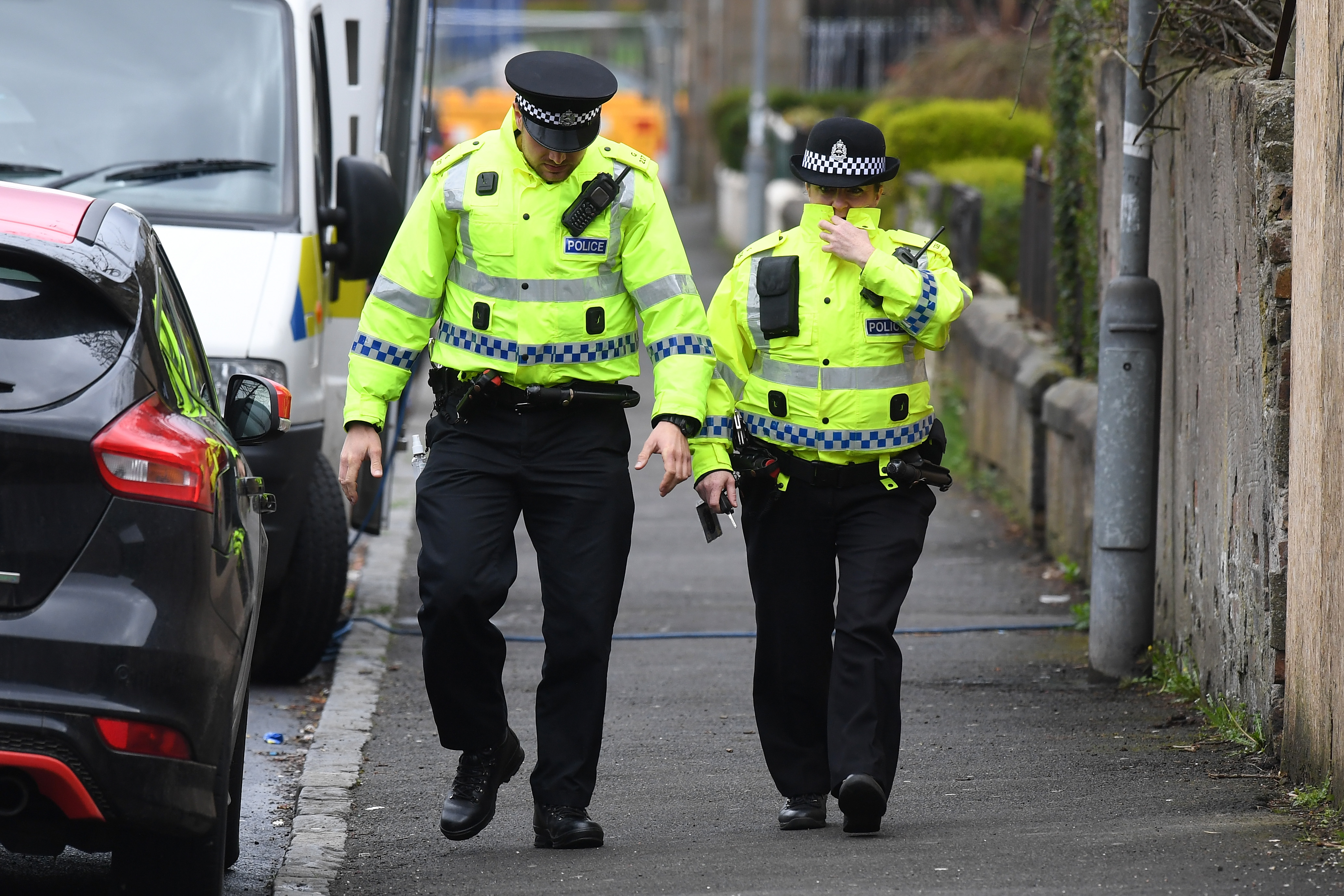 Police officials responded to the scene of the incident three days after the trio's death. (Getty Images)