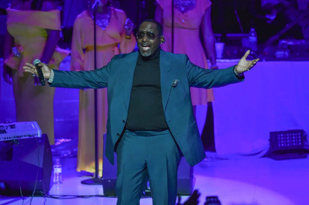 Singer Johnny Gill performs on stage at a Tribute Concert to celebrate the life of songstress Aretha Franklin at Chene Park on August 30, 2018 in Detroit, Michigan. (Photo by Aaron J. Thornton/Getty Images)