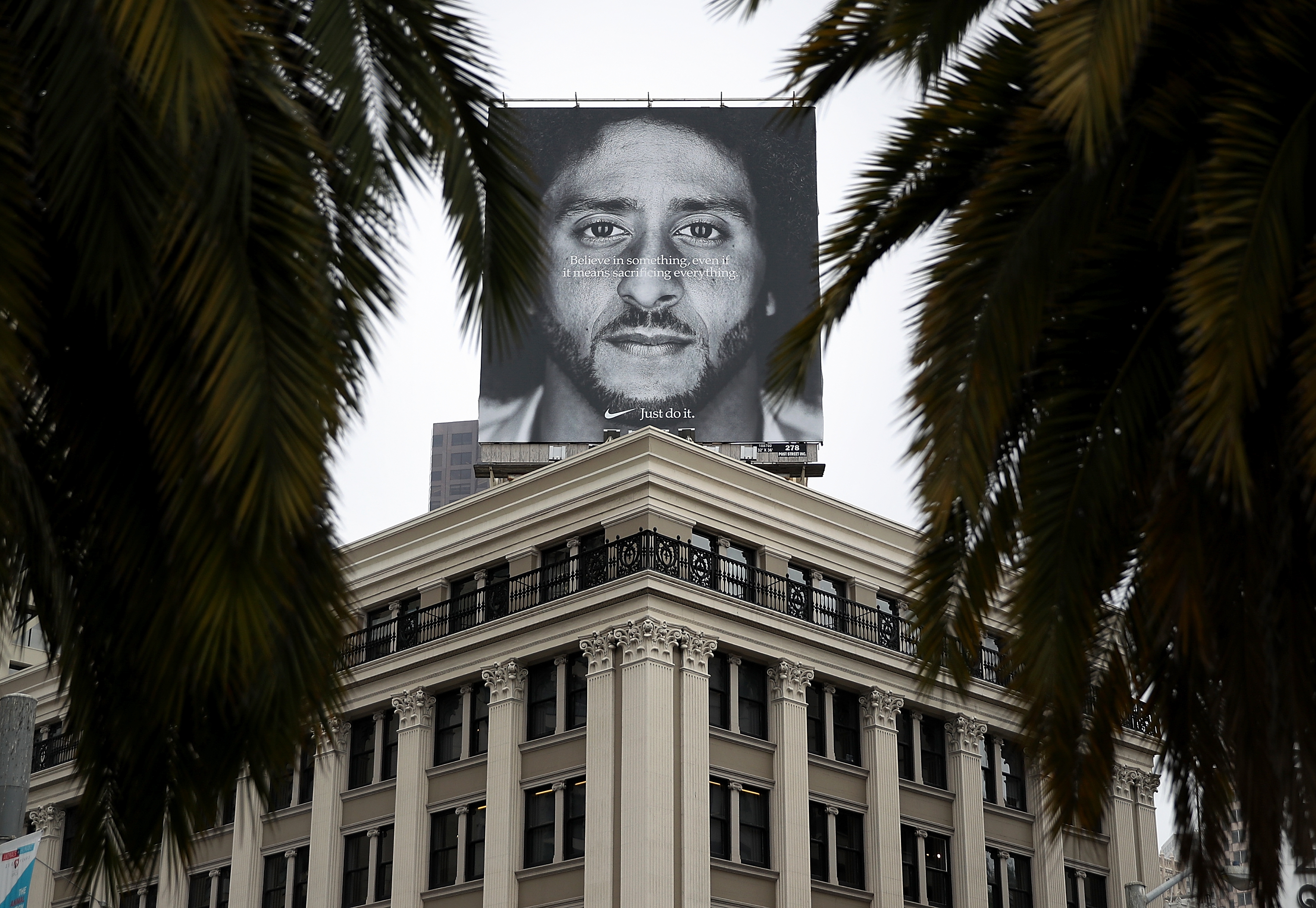 A billboard featuring former San Francisco 49ers quarterback Colin Kaepernick is displayed on the roof of the Nike Store on September 5, 2018, in San Francisco, California. (Getty)