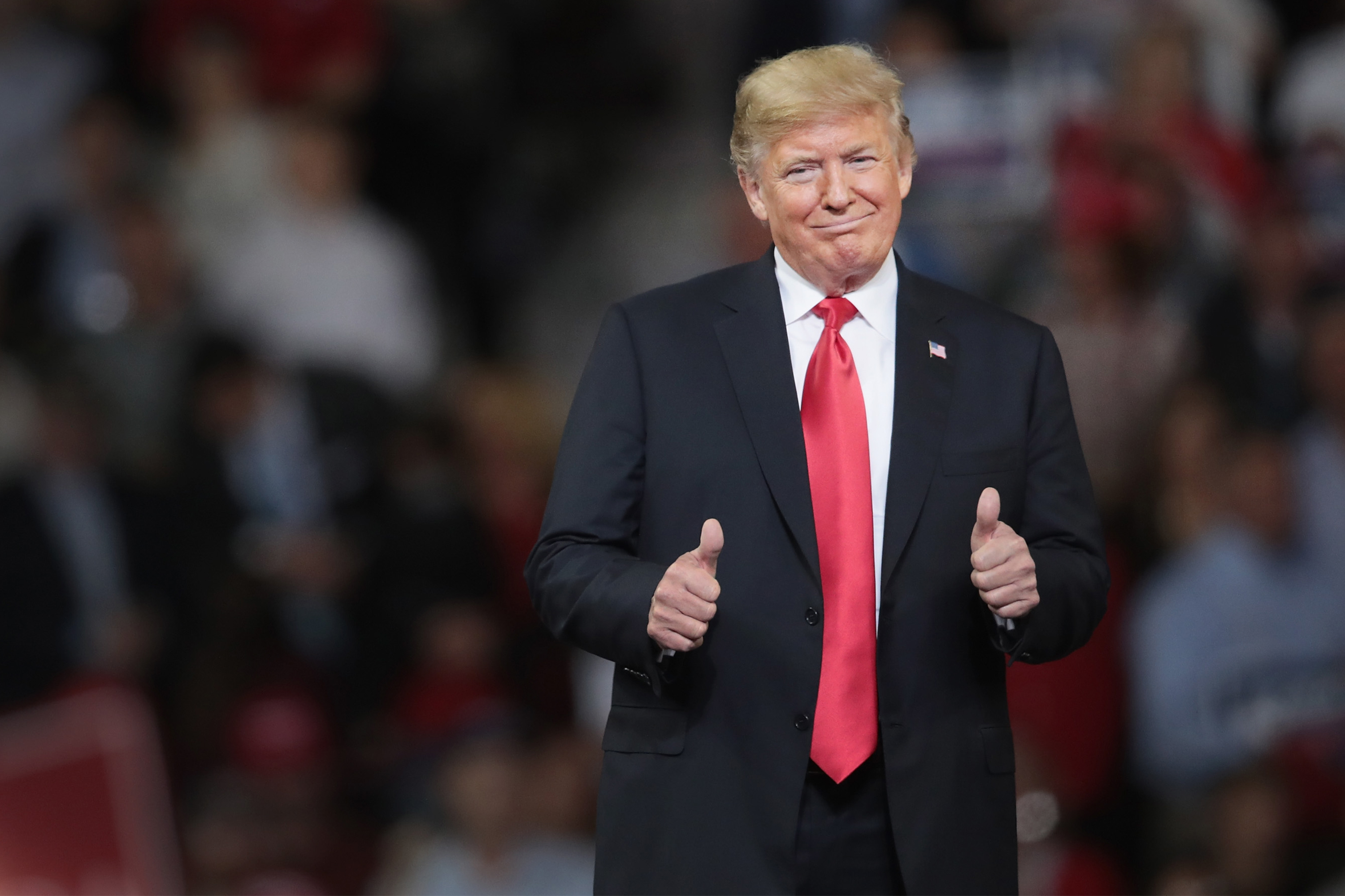 U.S. President Donald Trump gestures while speaking to supporters during a rally at the Kansas Expocenter on October 6, 2018 in Topeka, Kansas. Trump scored a political victory today when Judge Brett Kavanaugh was confirmed by the Senate to become the next Supreme Court justice.
