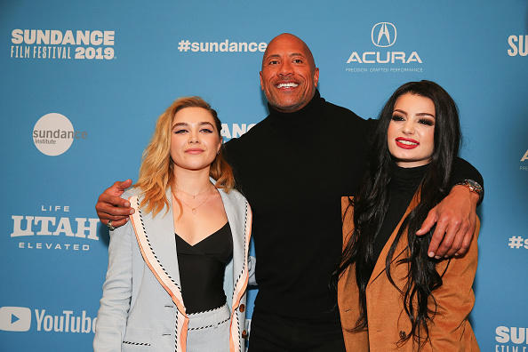 Florence Pugh, actor and producer Dwayne Johnson and Paige (Source: Getty Images)
