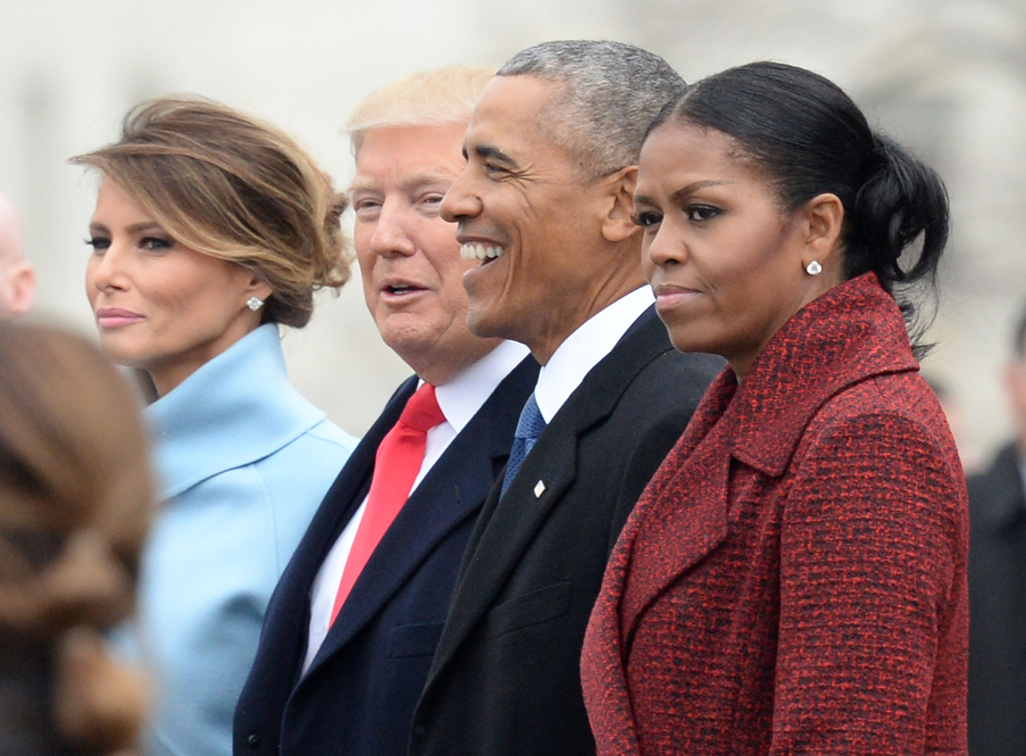 President Donald Trump, First Lady Melania Trump, former President Barack Obama and former First Lady Michelle Obama walk together following the inauguration, on Capitol Hill in Washington, D.C. on January 20, 2017. (Getty Images)