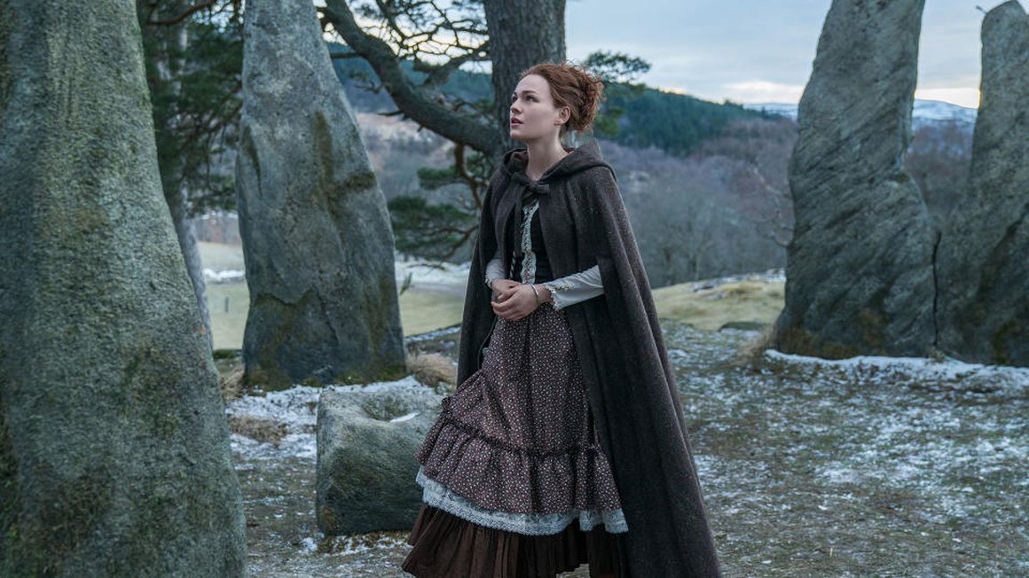 Brianna Fraser (Sophie Skelton) in season 4 of Outlander standing in the fictional place 'Craigh na Dun' (Starz)