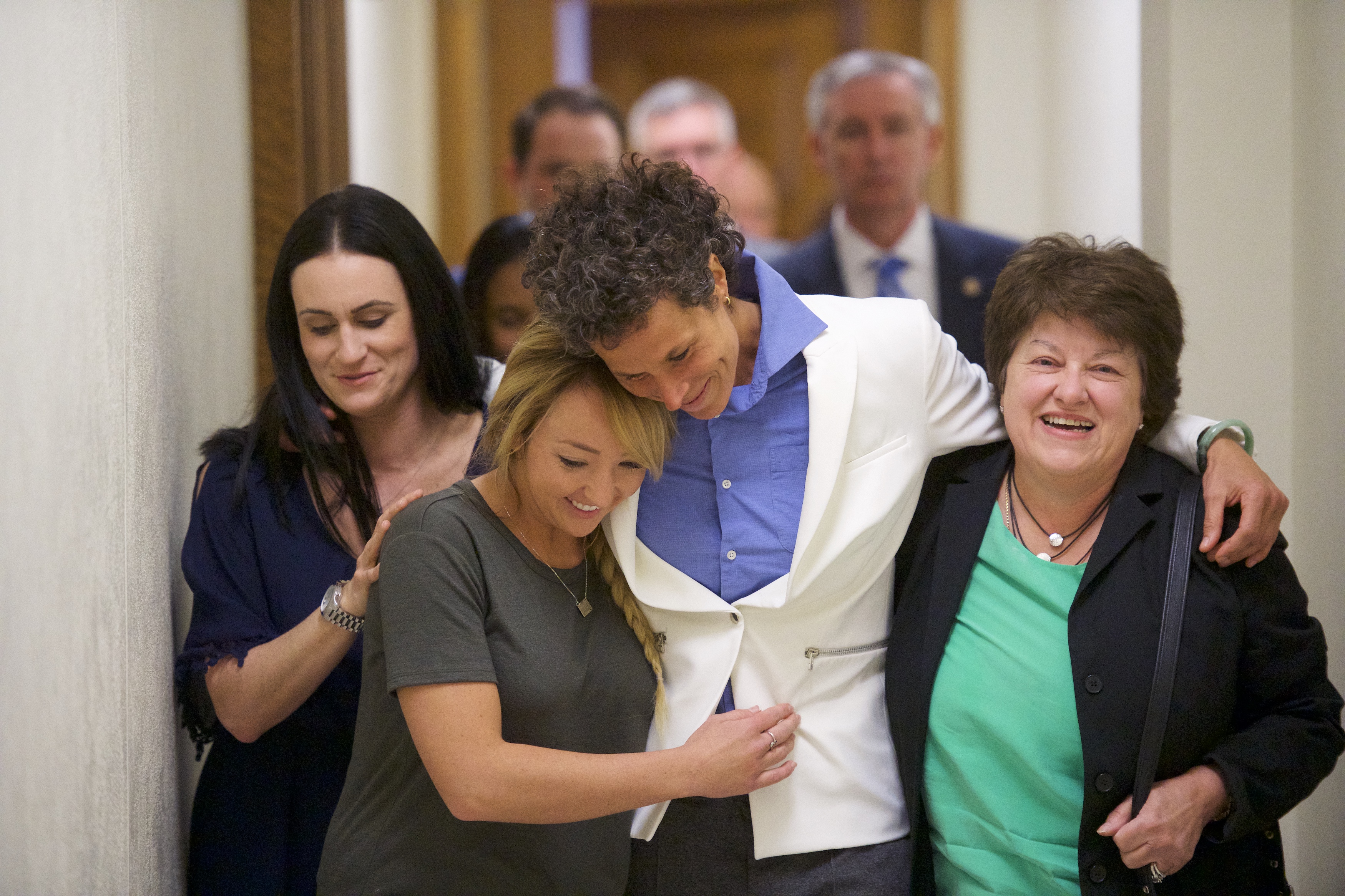 Bill Cosby accuser Andrea Constand (C) reacts with lawyer Dolores Troiani (R) and Delaney Henderson (L) after the guilty on all counts verdict was delivered in the sexual assault retrial at the Montgomery County Courthouse on April 26, 2018 in Norristown, Pennsylvania. Cosby was found guilty on all accounts after a former Temple University employee alleges that the entertainer drugged and molested her in 2004 at his home in suburban Philadelphia. More than 40 women have accused the 80 year old entertainer of sexual assault.