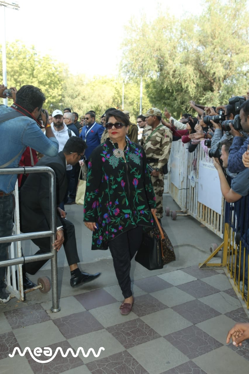 Priyanka's mother Madhu Chopra as she accompanies the newlyweds on their flight to Delhi ahead of their impending reception in the Indian capital. (Meaww Photos)