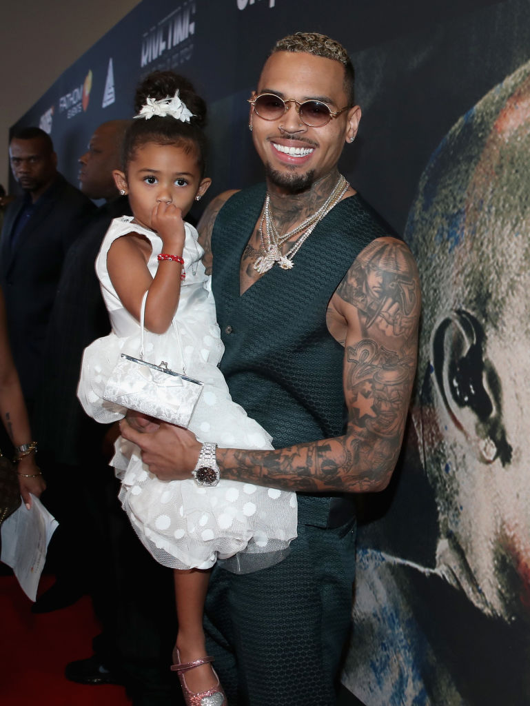Singer Chris Brown (R) and his daughter Royalty attend the Premiere Of Riveting Entertainment's 'Chris Brown: Welcome To My Life' at L.A. LIVE on June 6, 2017 in Los Angeles, California. (Photo by Jonathan Leibson/Getty Images)