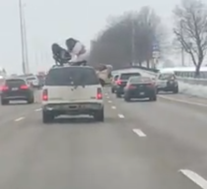 Two women spotted gyrating vigorously on vehicle while another films it (Source: Facebook)