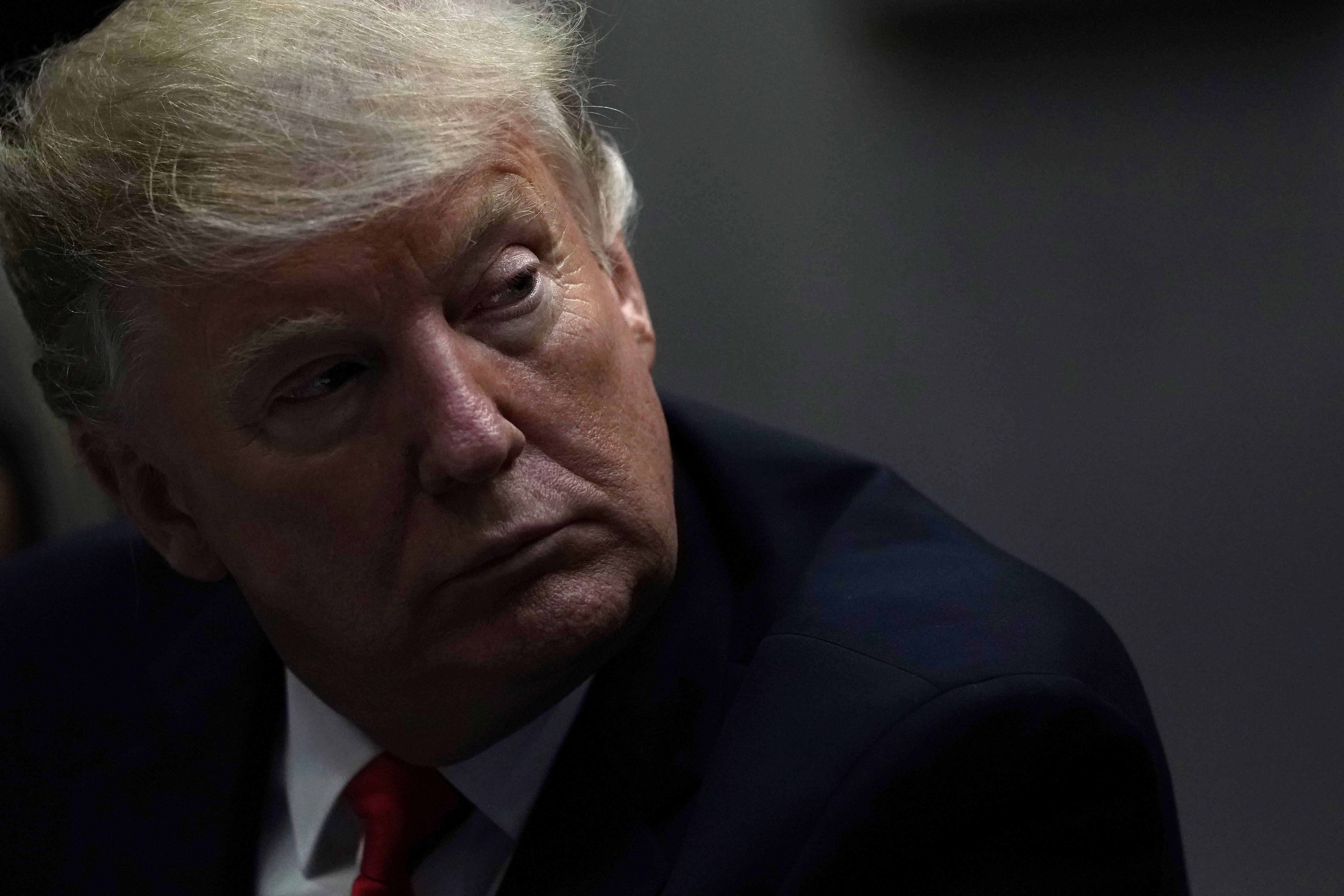 U.S. President Donald Trump listens during a meeting with Hispanic pastors at the Roosevelt Room of the White House January 25, 2019 in Washington, DC. President Trump held a roundtable with Hispanic pastors to discuss border security and economy. (Getty Images)