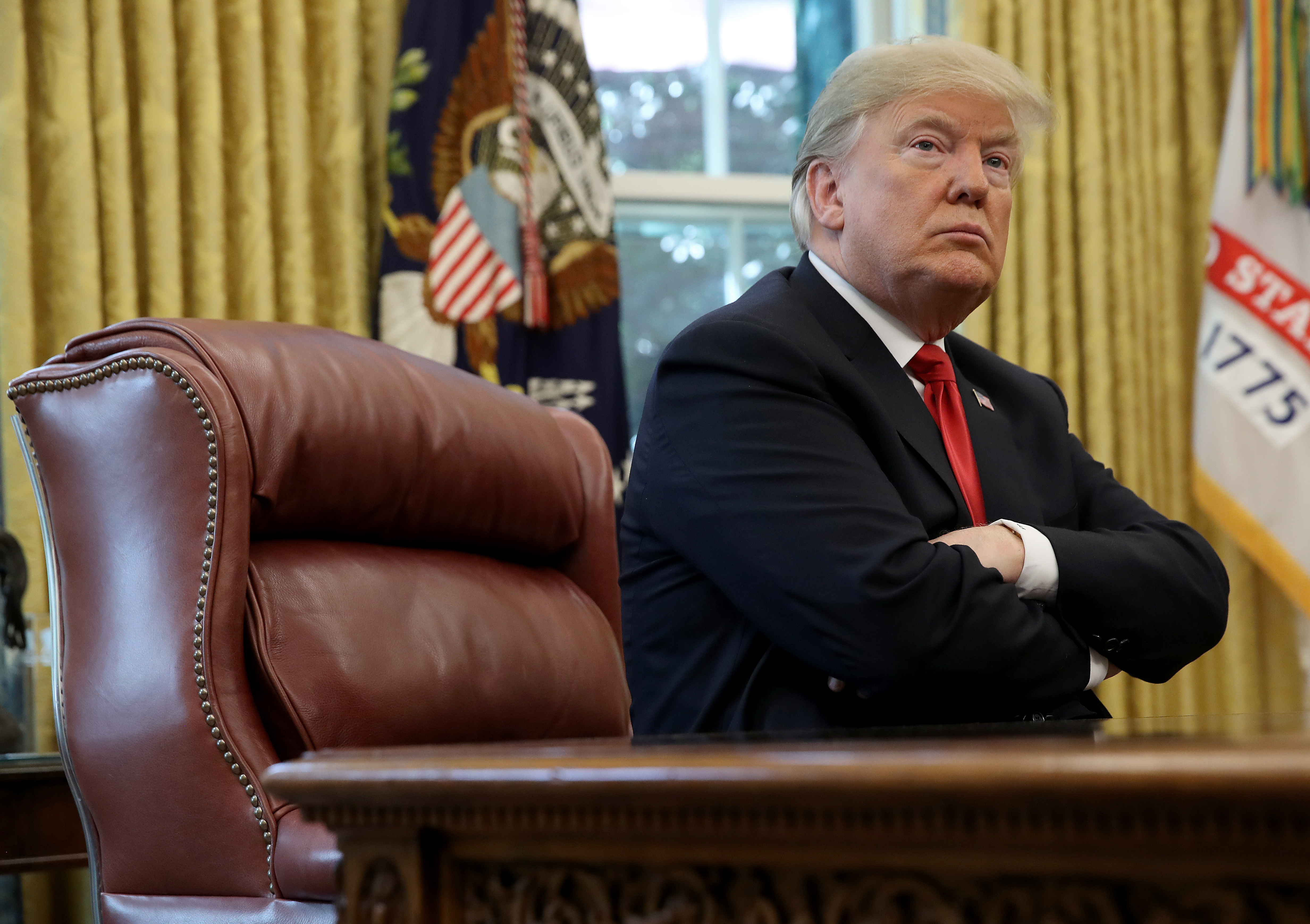 U.S. President Donald Trump (L) discusses the potential impact of Hurricane Michael during a meeting with Homeland Security Secretary Kirstjen Nielsen and FEMA Administrator Brock Long in the Oval Office of the White House on October 10, 2018 in Washington, DC. (Getty Images)
