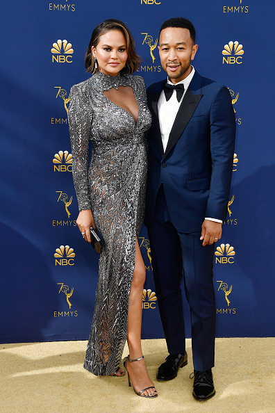 Chrissy Teigen (L) and John Legend attend the 70th Emmy Awards at Microsoft Theater on September 17, 2018 in Los Angeles, California. (Photo by Frazer Harrison/Getty Images)