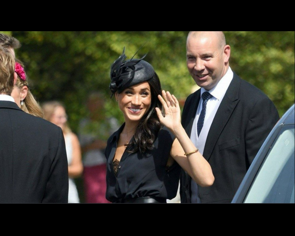 The Duchess suffered a wardrobe malfunction as her top became unbuttoned giving people a glimpse of the lacy bra she was wearing underneath it (Source: Twitter)
