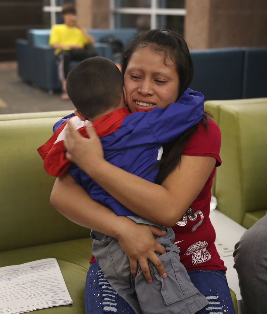 A woman, identified only as Maria, is reunited with her son Franco, 4, at the El Paso International Airport on July 26, 2018, in El Paso, Texas (Source: Joe Raedle/Getty Images)