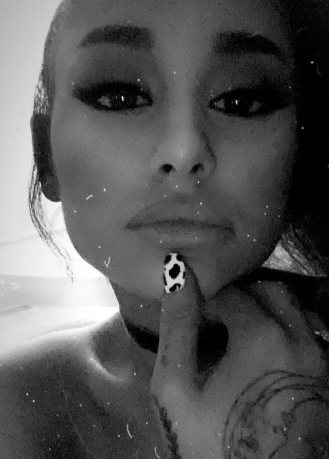 Ariana Grande posted an Instagram Story with a cow print nail design (Instagram)