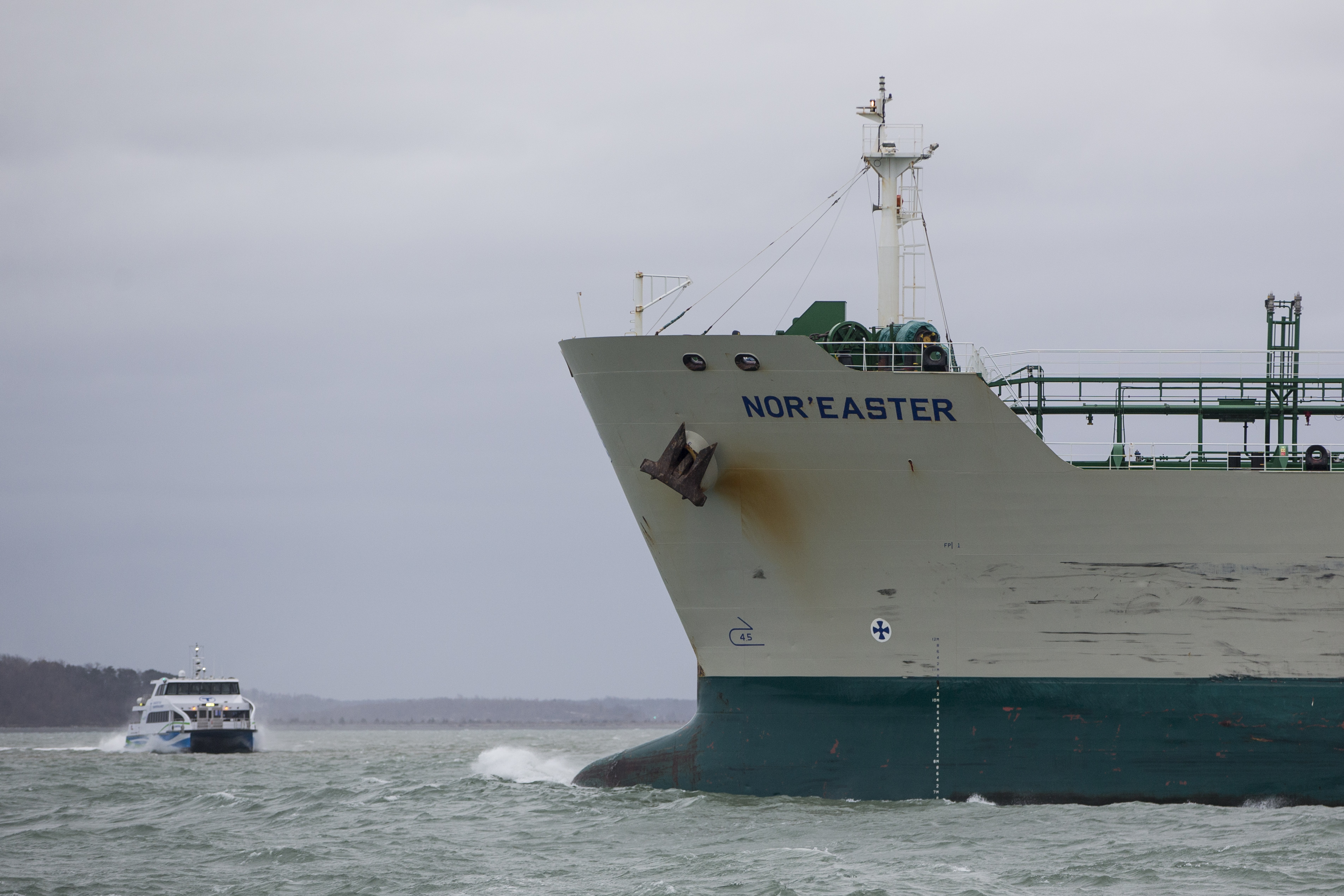 The bow of the oil tanker 'Nor'Easter,' the last ship able to leave due to deteriorating weather conditions, departs Boston Harbor on March 21, 2018 in Boston, Massachusetts.