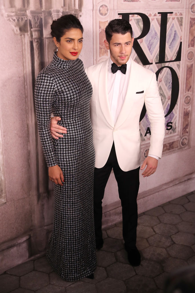 Priyanka Chopra and Nick Jonas attend the Ralph Lauren fashion show during New York Fashion Week at Bethesda Terrace on September 7, 2018 in New York City. (Photo by Rob Kim/Getty Images)