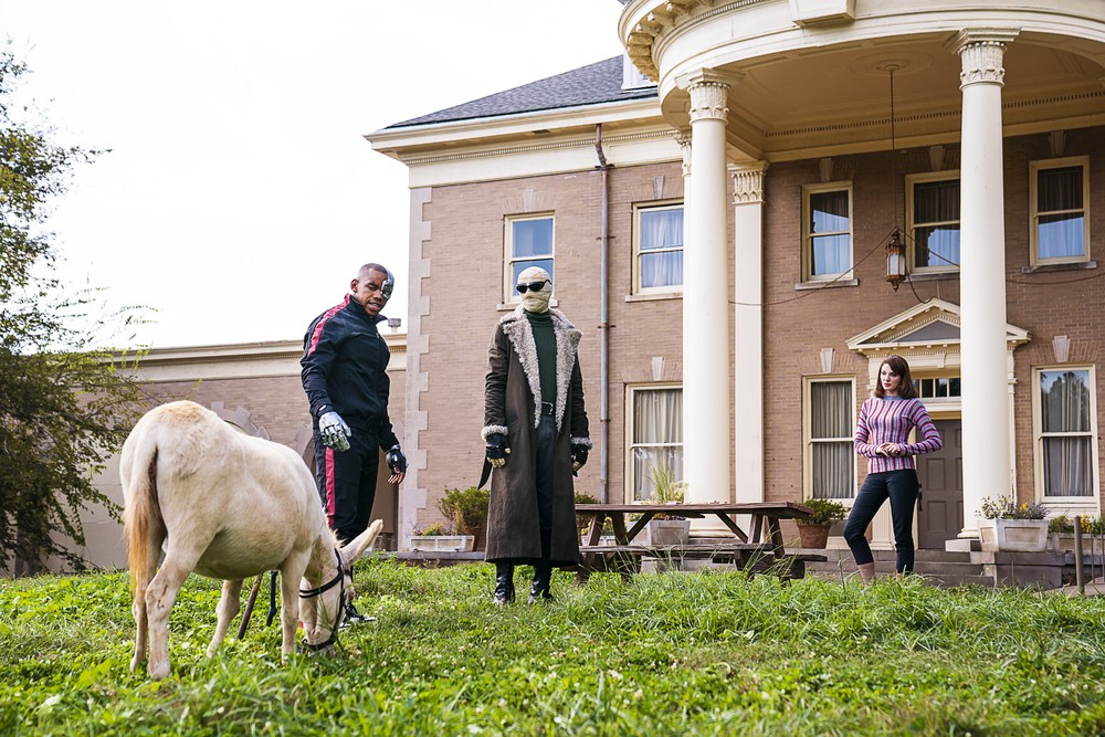 Mr. Nobody's donkey, Cyborg, Negative Man and Elasti-Woman contemplating their father figures fate in 'Doom Patrol'.
(Source: WBTV)