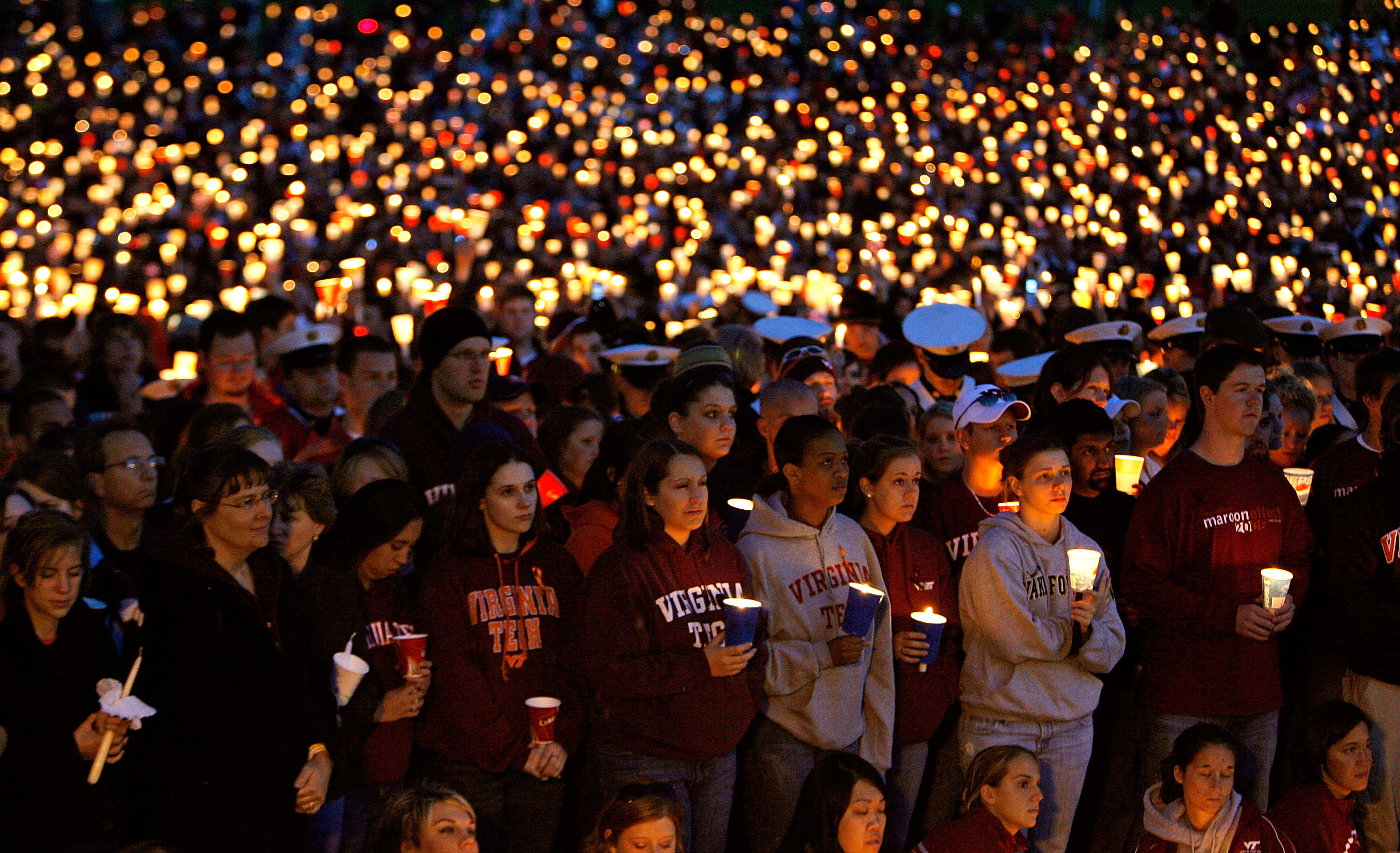Thousands of people attend a candlelight vigil on the campus of Virginia Tech April 17, 2007, in Blacksburg, Virginia. According to police, English major Cho Seung-Hui, 23, a native of South Korea, went on a shooting rampage that left a total of 33 people dead. It was the worst mass shooting in US history. (Source: Chip Somodevilla/Getty Images)