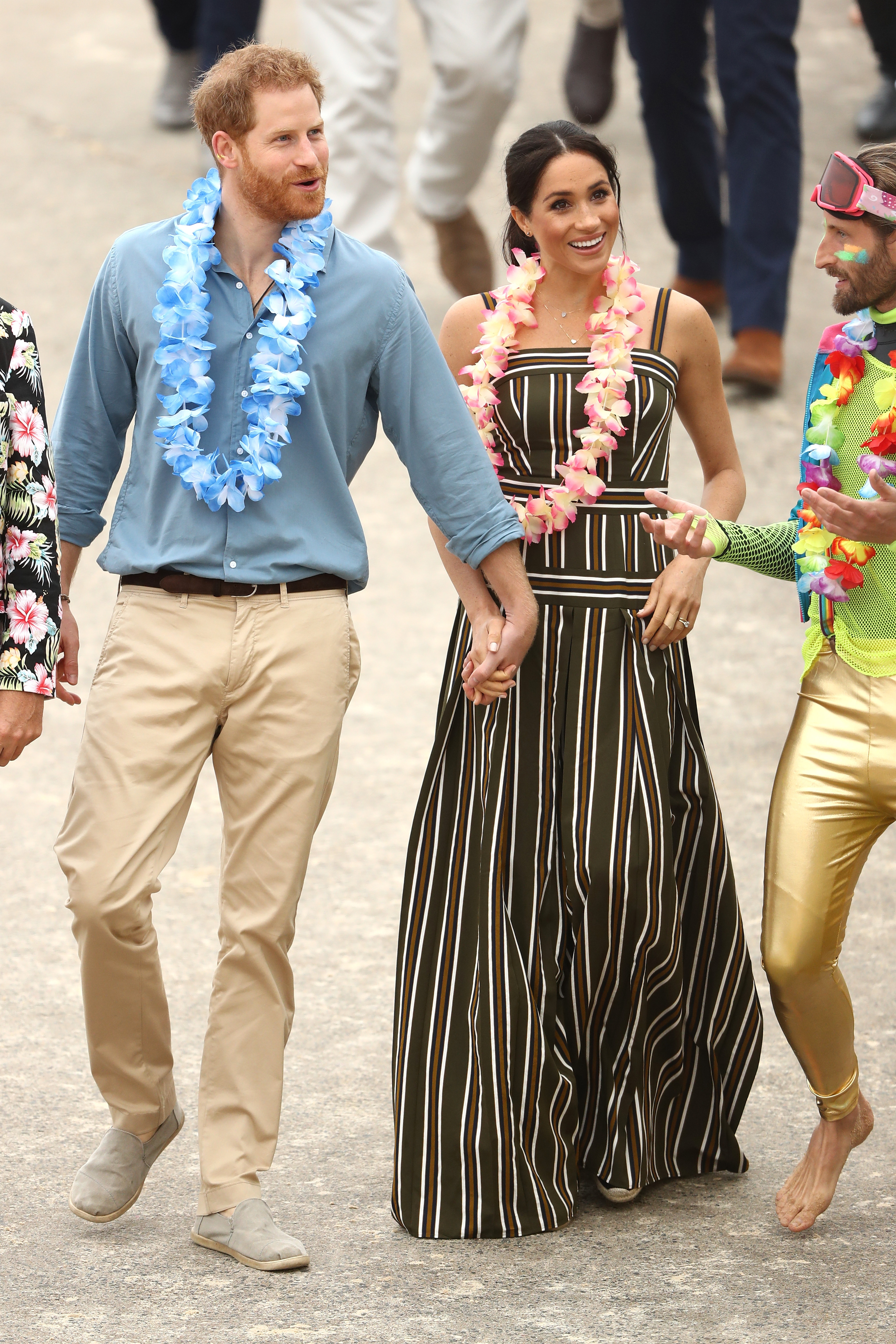Prince Harry, Duke of Sussex and Meghan, Duchess of Sussex meet Grant Trebilco and Sam Schumacher, founder and co-founder of OneWave, a local surfing community group raising awareness for mental health and wellbeing at Bondi Beach on October 19, 2018, in Sydney, Australia. (Getty Images)