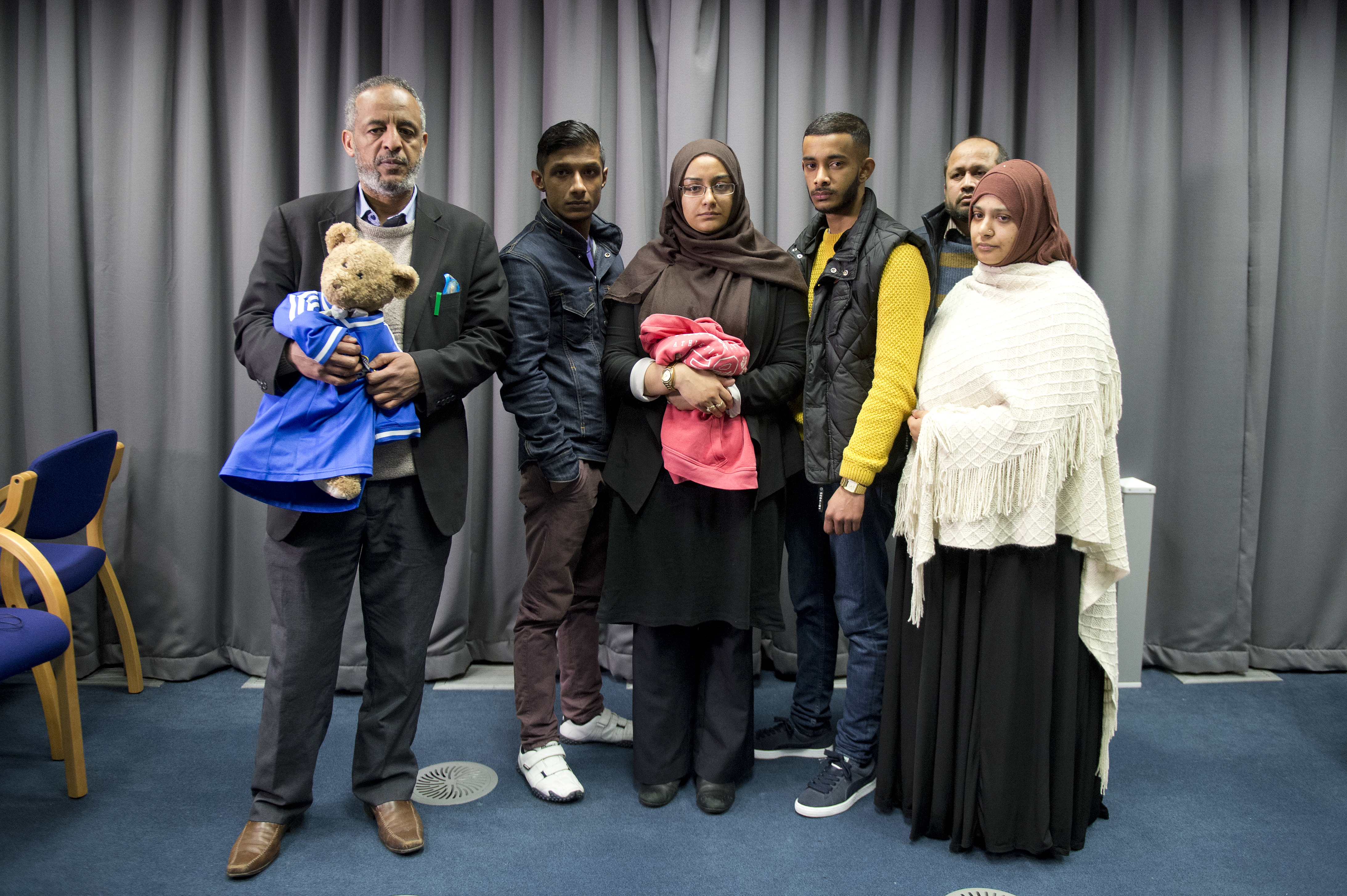 The famiiles of Amira Abase and Shamima Begum, the three missing schoolgirls believed to have fled to Syria to join Islamic State, pose after being interviewed by the media at New Scotland Yard, after pleading for them to return home, on February 22, 2015 in London, England. (Getty Images)