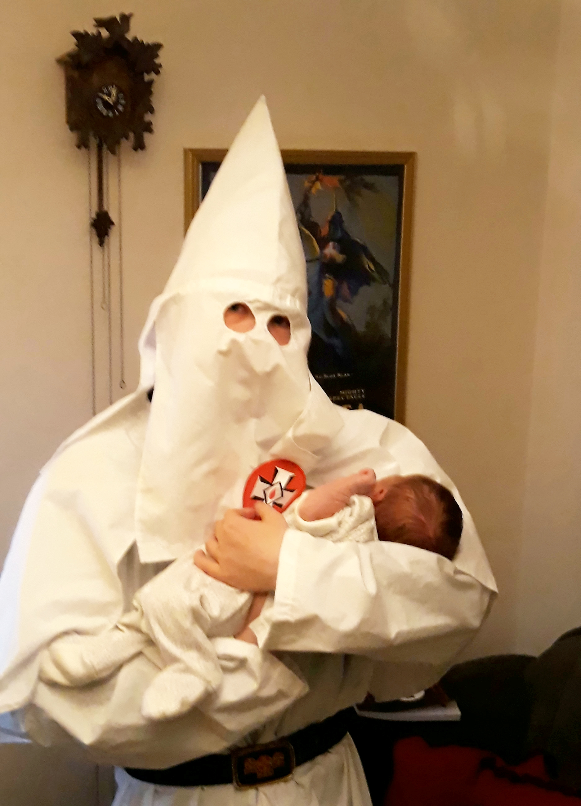 Jurors were shown a photo that allegedly shows Adam Thomas, who is accused of being a neo-Nazi terrorist, posing with his new-born baby (Source: SWNS)