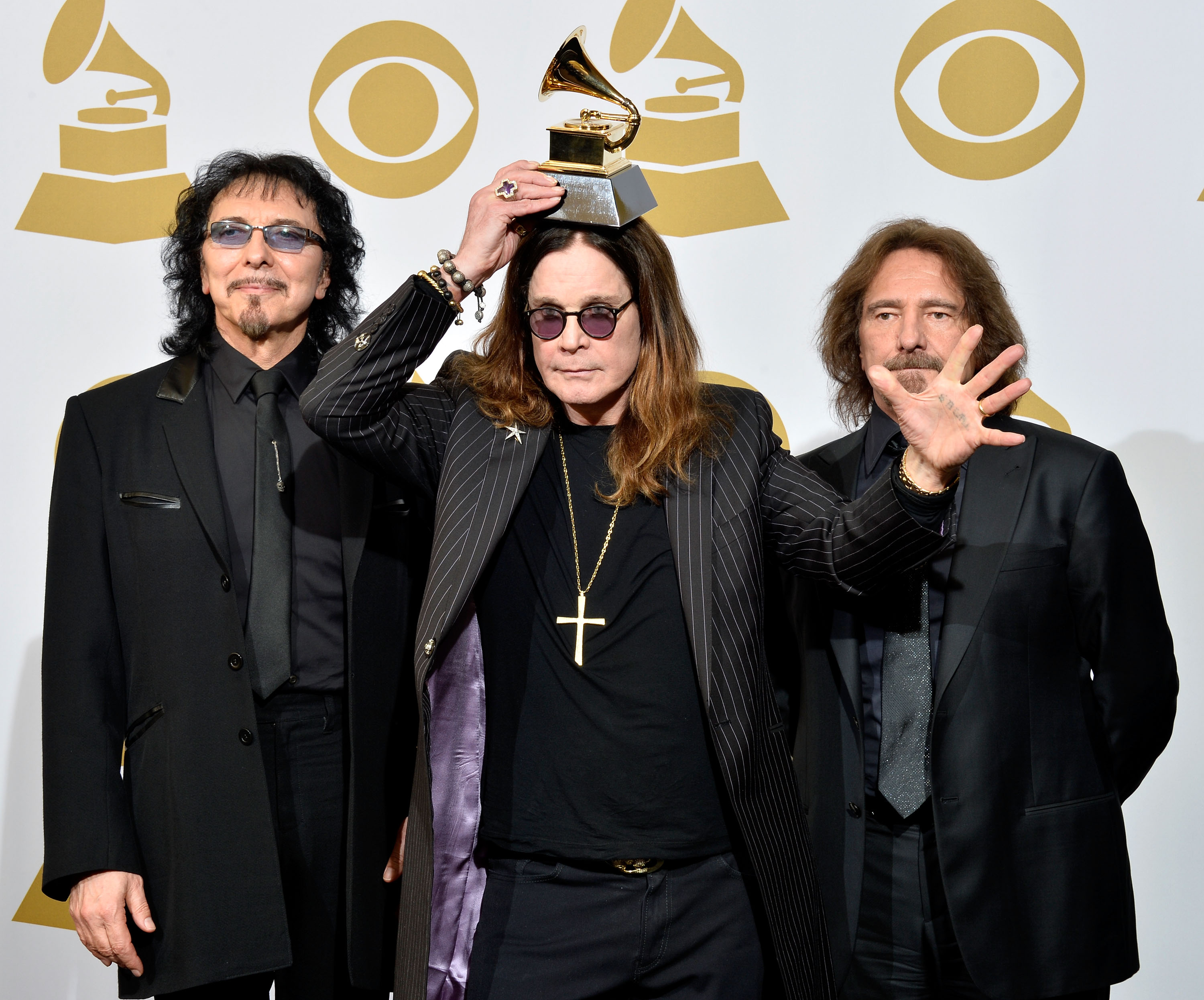 (L-R) Tony Iommi, Ozzy Osbourne and Geezer Butler of Black Sabbath pose in the press room during the 56th GRAMMY Awards at Staples Center on January 26, 2014 in Los Angeles, California. (Photo credit: Getty Images)