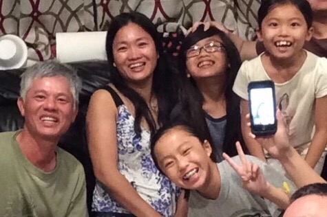 Mau Dao (2nd from left) set herself on fire and ended up killing her two daughters and injuring one (GoFundMe)